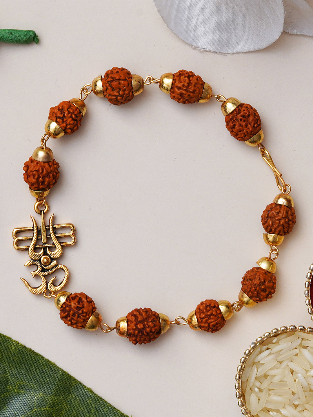 Om Trishul Rudraksha Bracelet Rakhi for Brother with Roli Chawal Pack