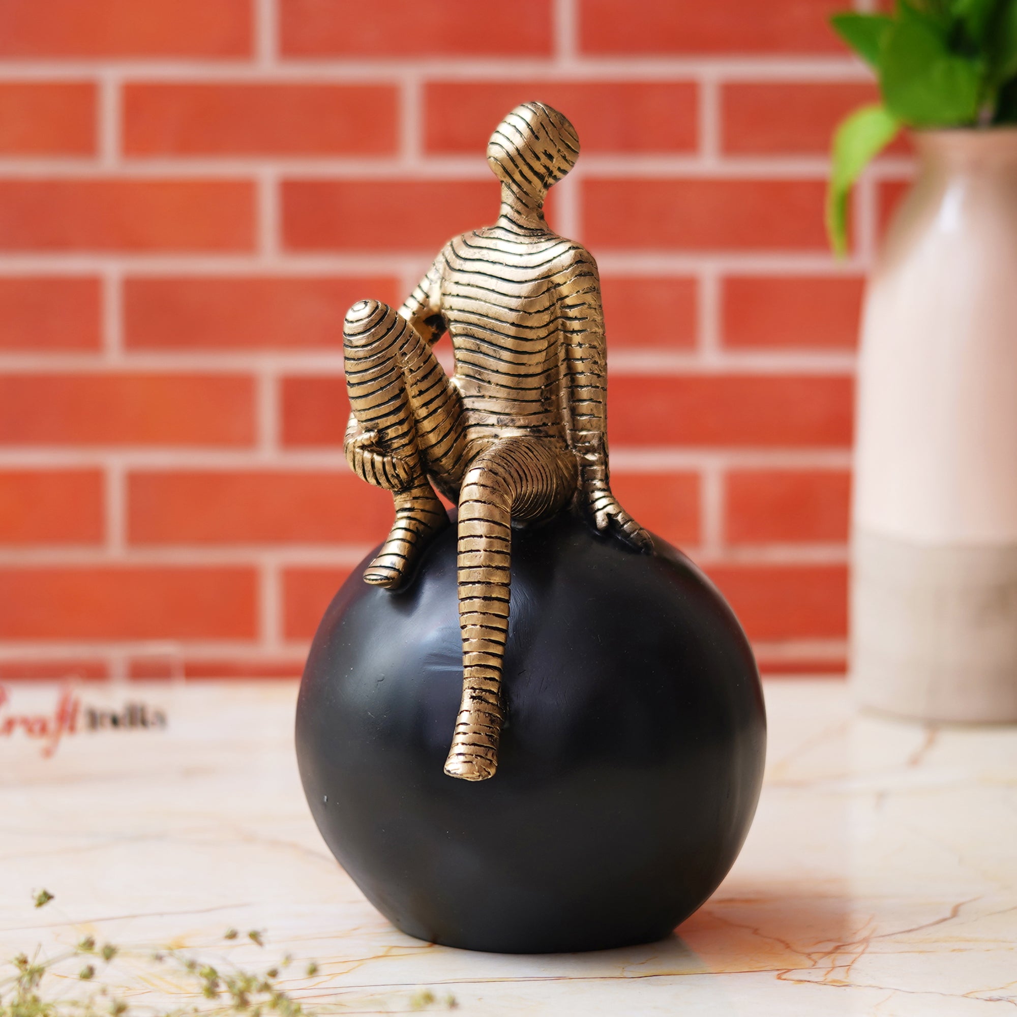 Golden Boy Statue Sitting on Black Ball Human Figurine Decorative Showpiece 1