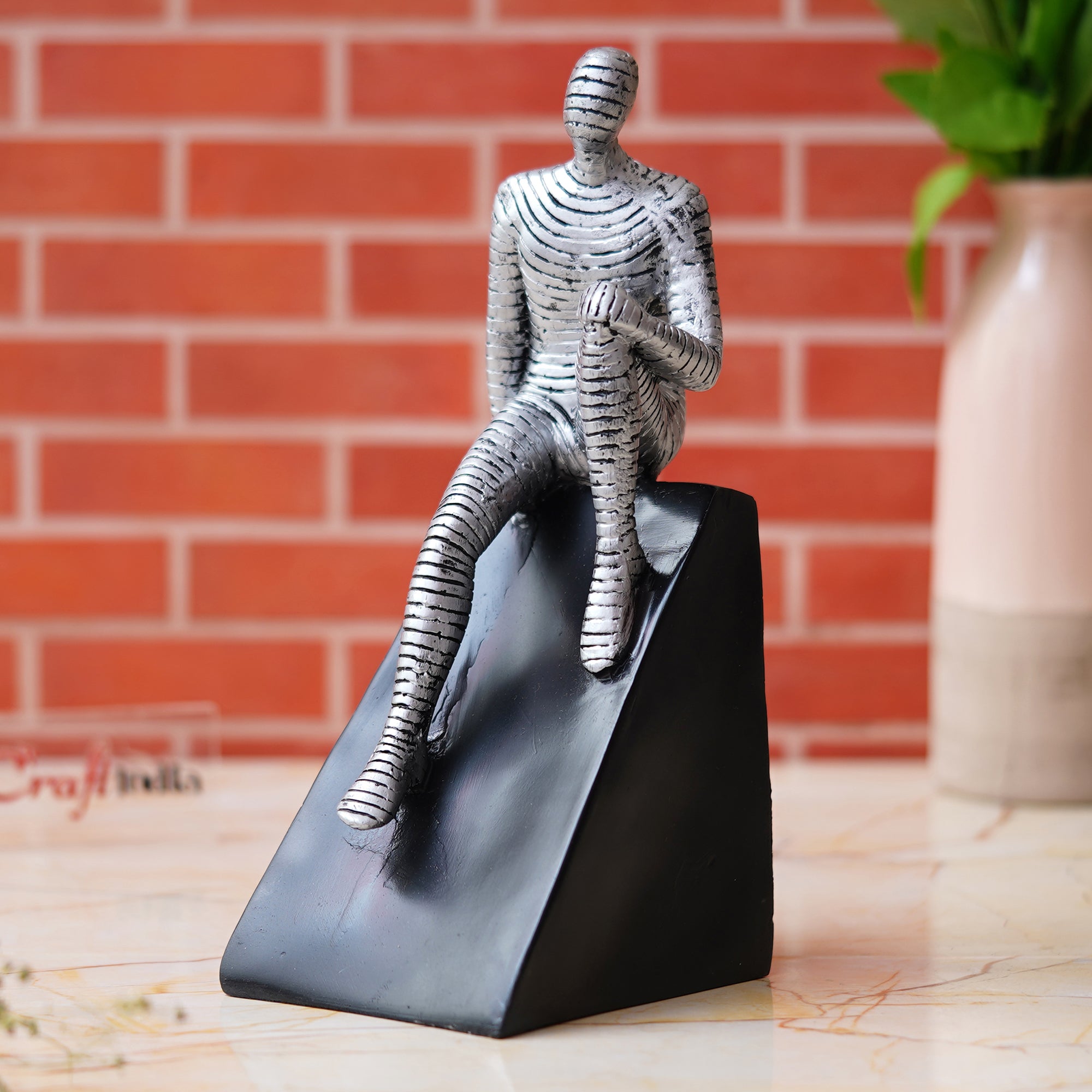 Silver Man Statue Sitting on Triangle Black Base Human Figurine Decorative Showpiece