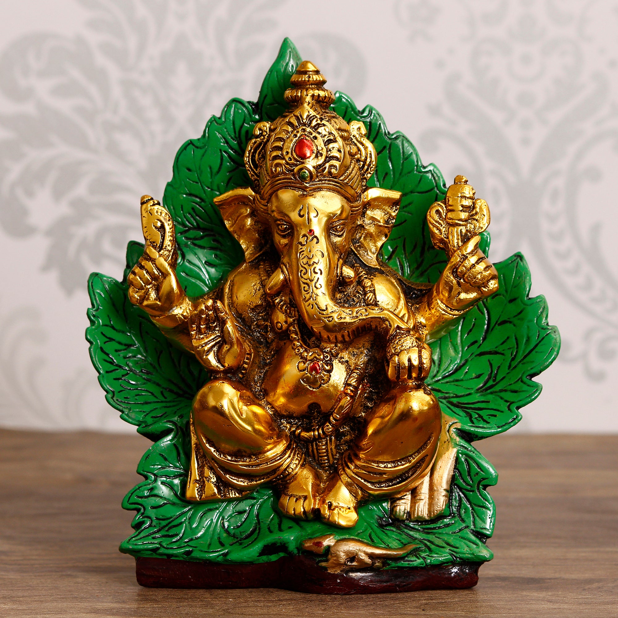 Golden Metal Lord Ganesha Idol Sitting on Green Throne 1