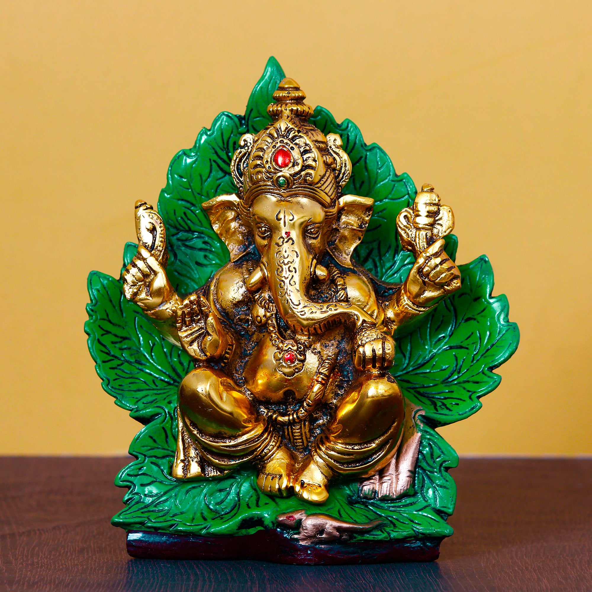 Golden Metal Lord Ganesha Idol Sitting on Green Throne