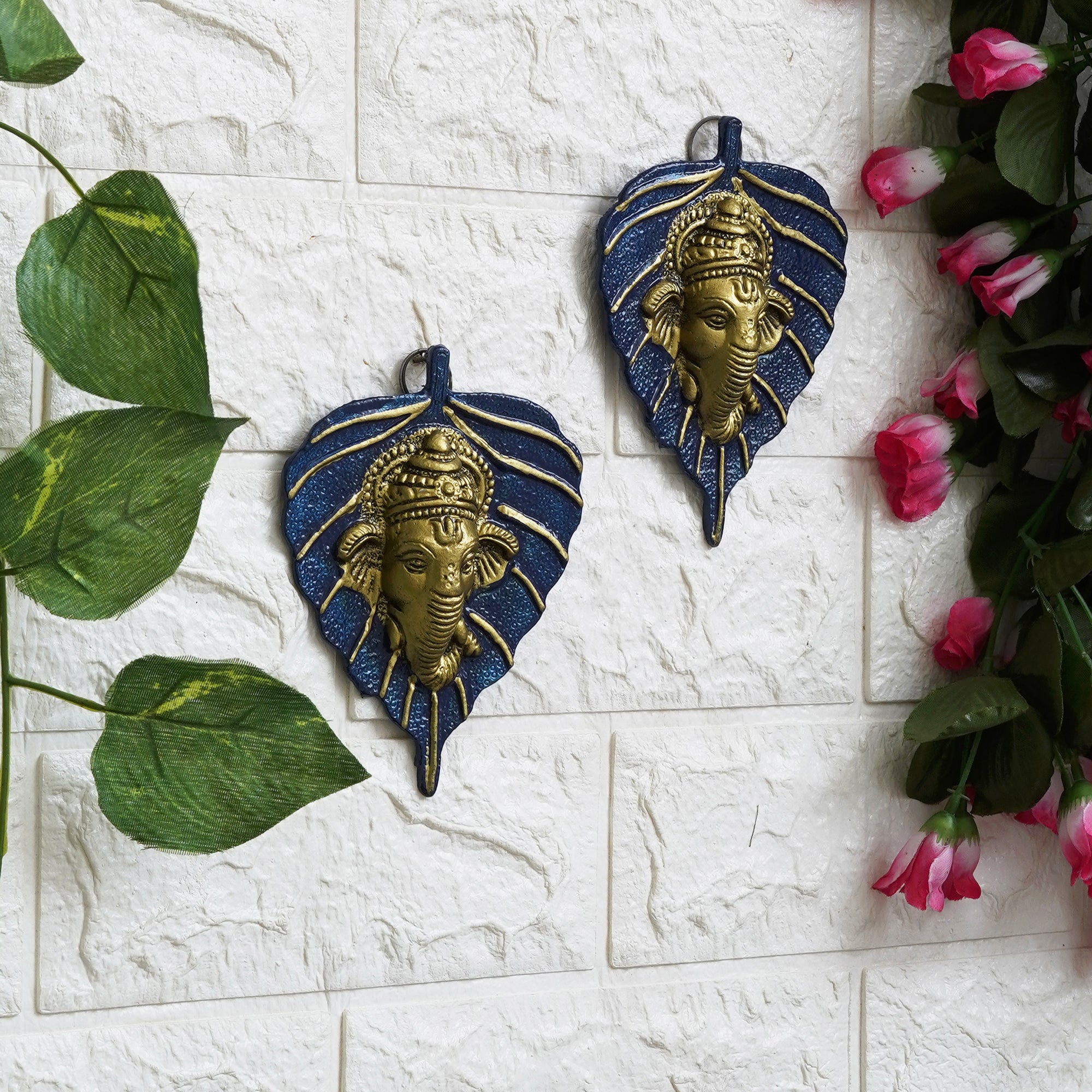 eCraftIndia Set of 2 Golden and Blue Peepal Leaf Ganesha Wall Hangings 1