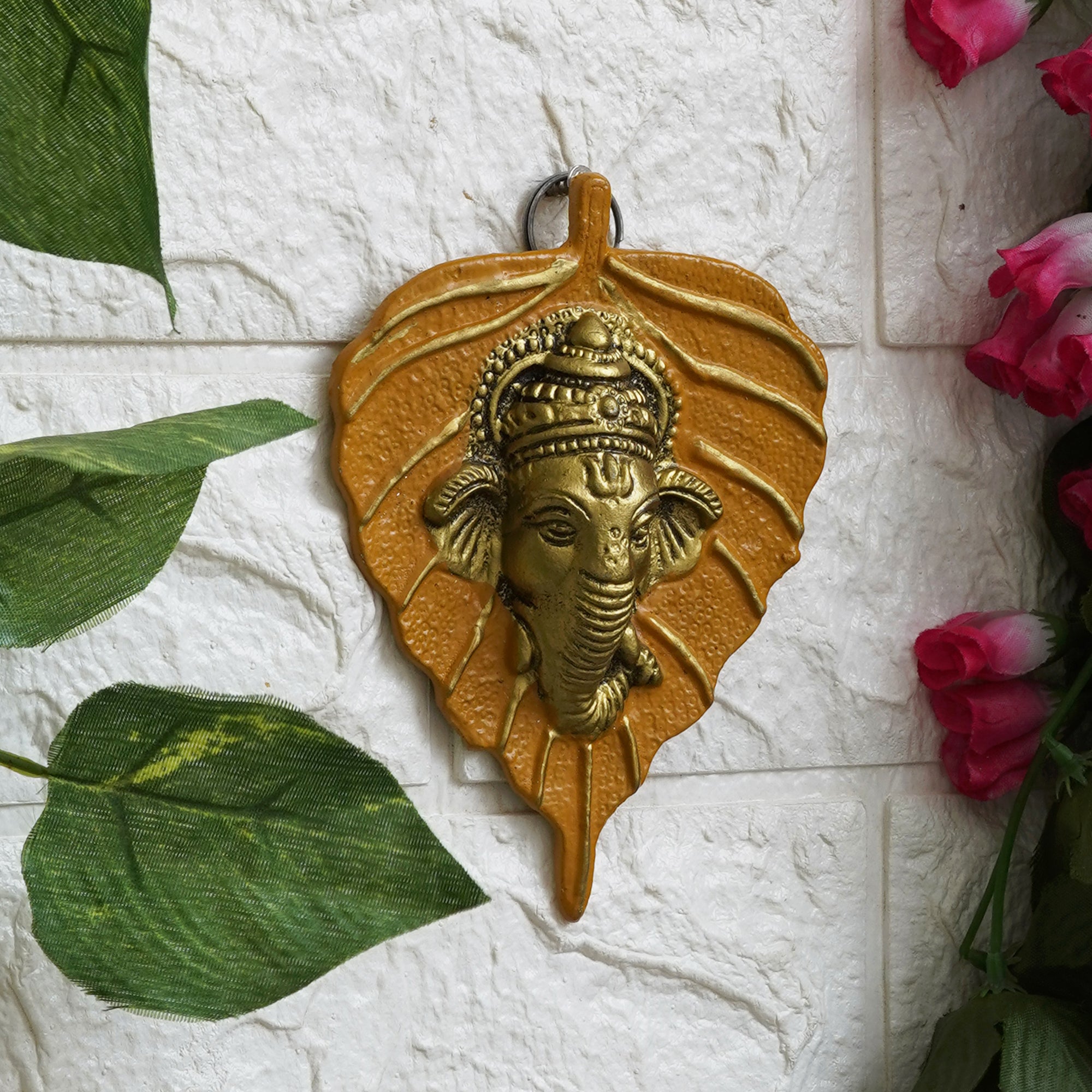 eCraftIndia Yellow & Golden Lord Ganesha Face On Leaf Wall Hanging Decorative Showpiece 1