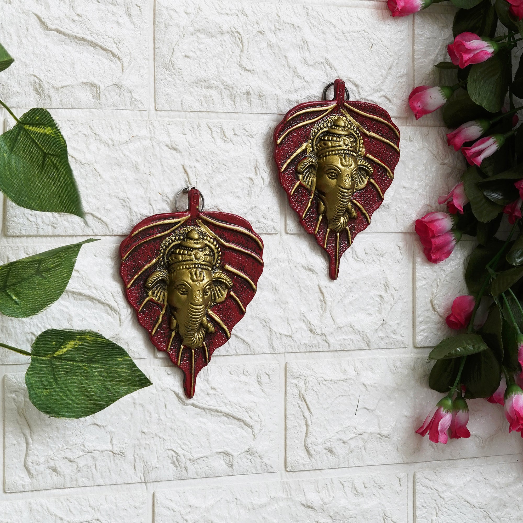 eCraftIndia Set of 2 Golden and Red Peepal Leaf Ganesha Wall Hangings 1