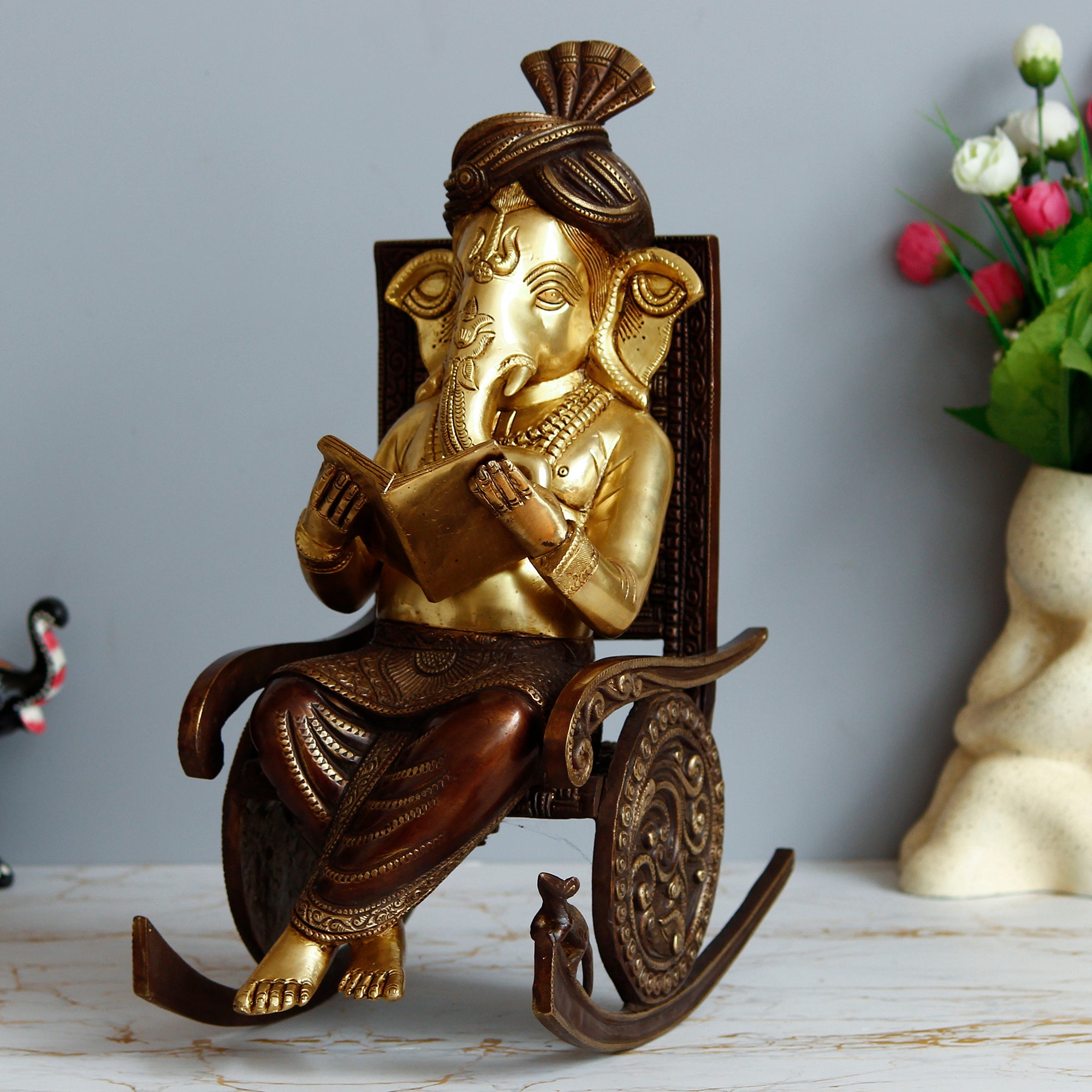 Golden Brass Lord Ganesha Idol Reading Book and Sitting on Rocking Chair 1