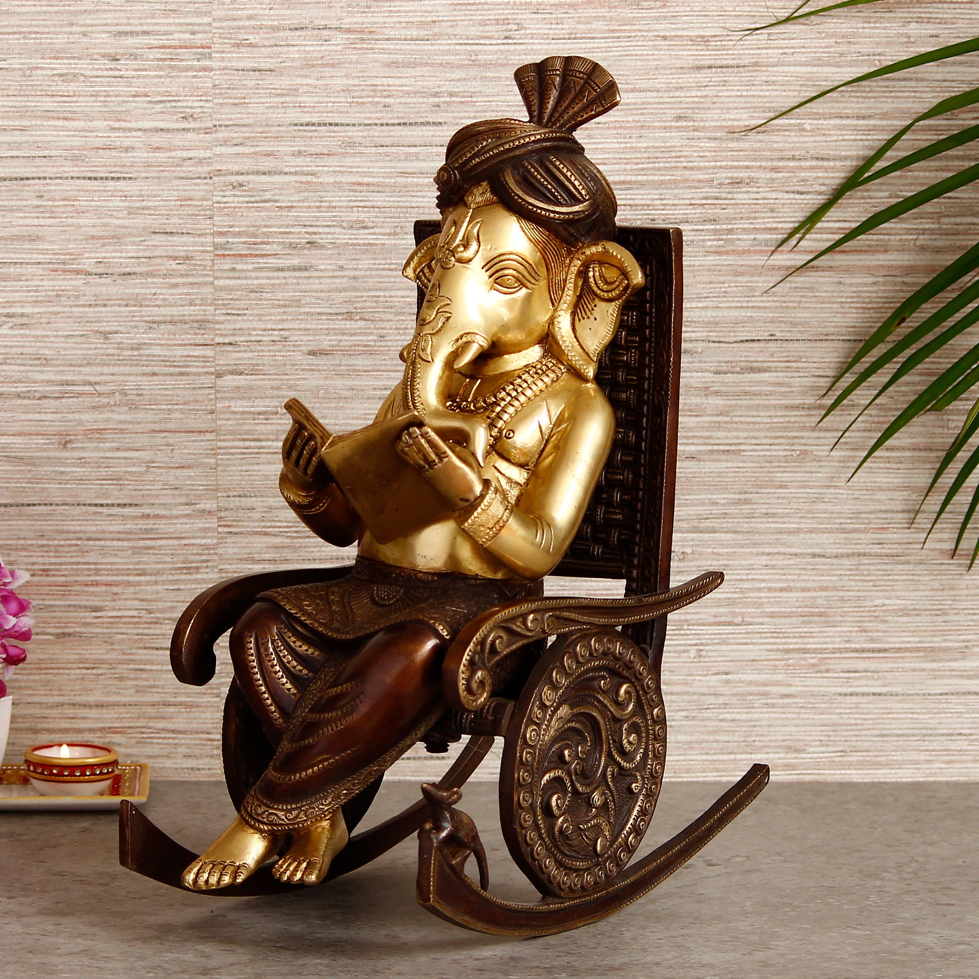 Golden Brass Lord Ganesha Idol Reading Book and Sitting on Rocking Chair