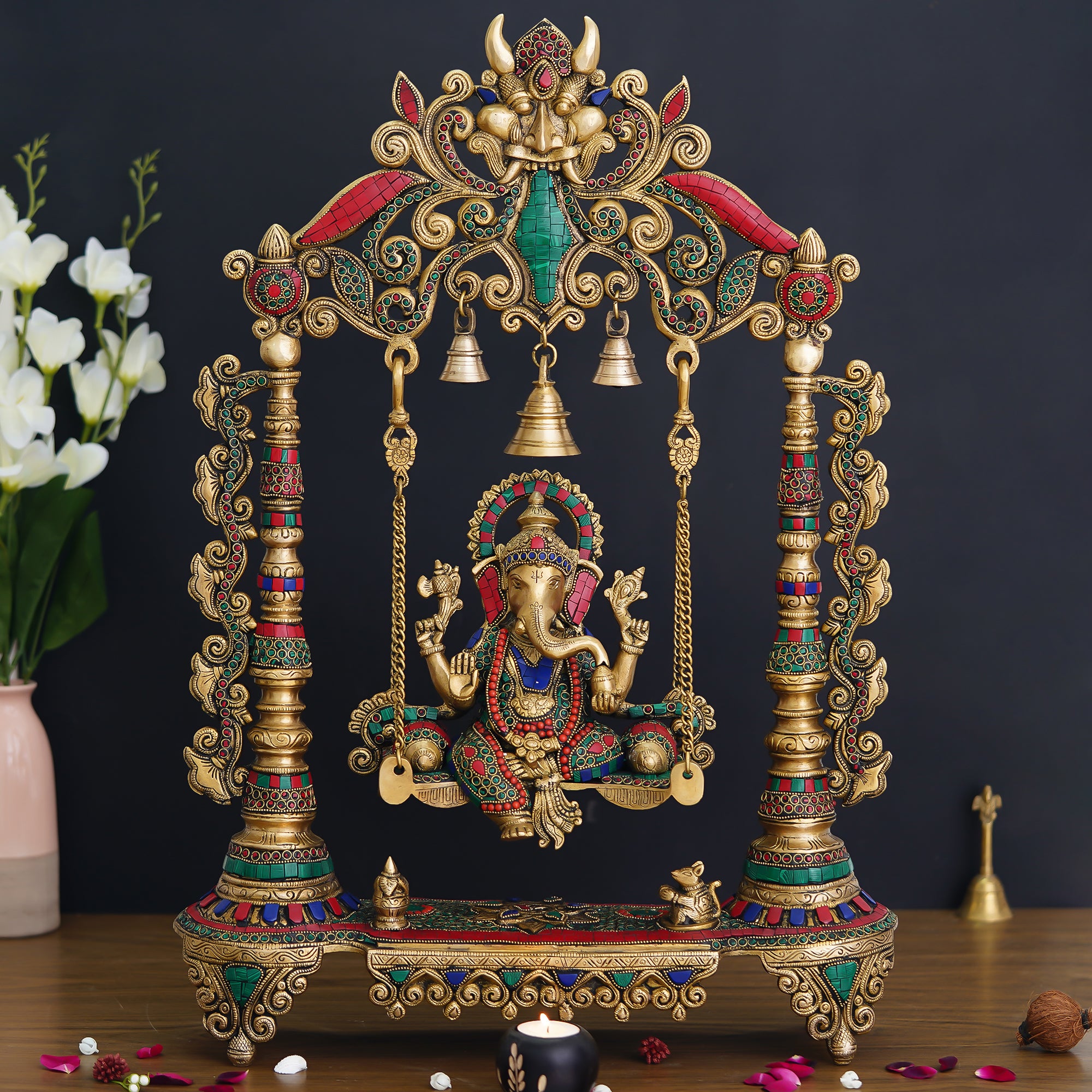 Stone Work Brass Handcrafted Lord Ganesha Idol on a Decorated Swing