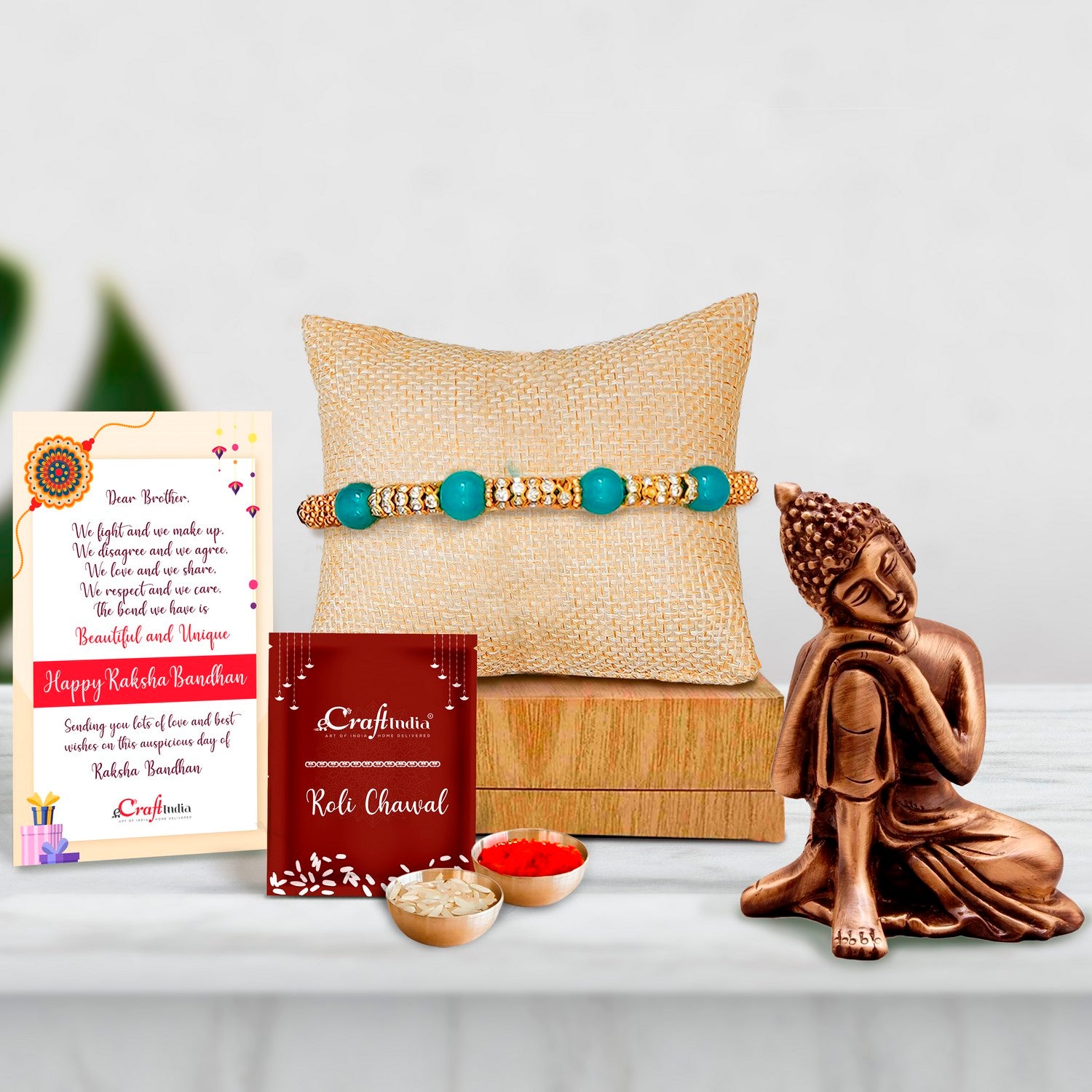 Designer Pearl Rakhi with Brass Buddha Resting Antique Artifact and Roli Chawal Pack, Best Wishes Greeting Card