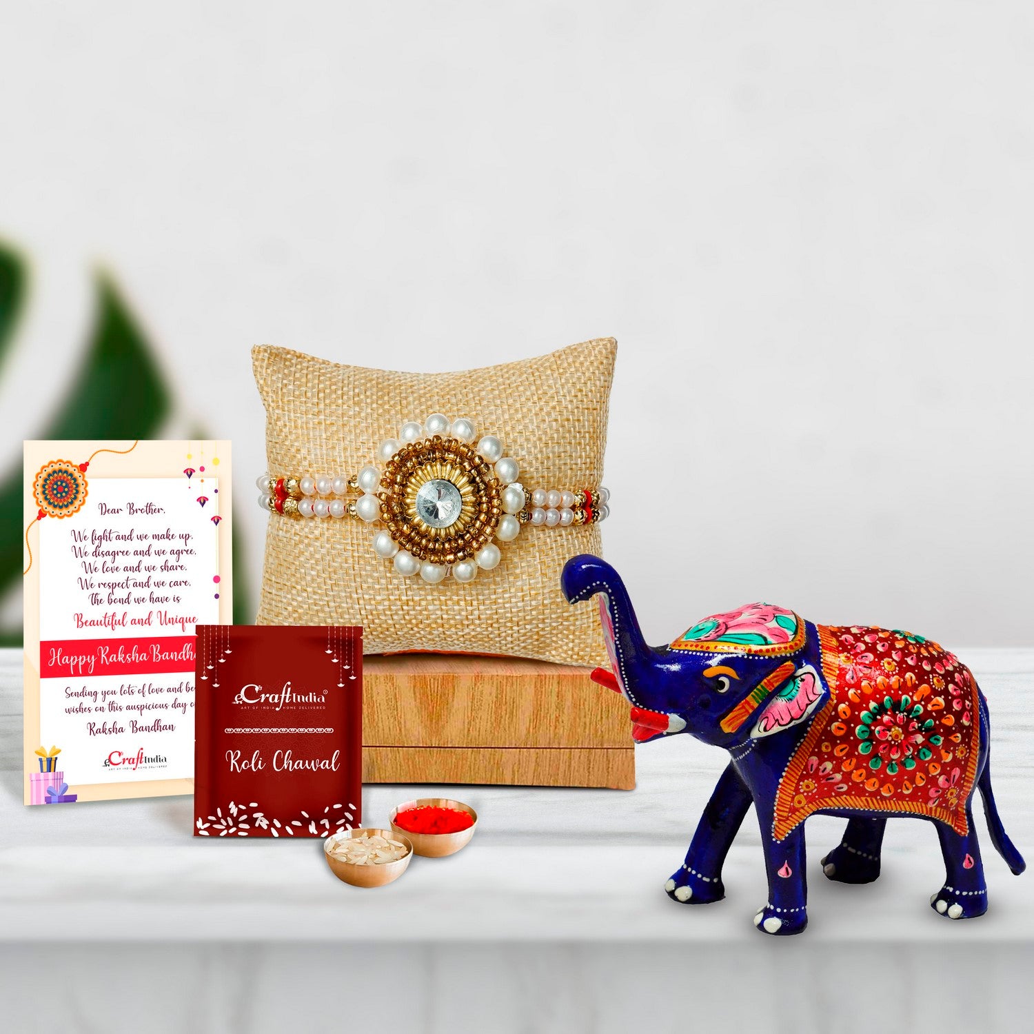 Designer Handcrafted Stone Pearl Rakhi with Meenakari Delightful Elephant and Roli Chawal Pack, Best Wishes Greeting Card