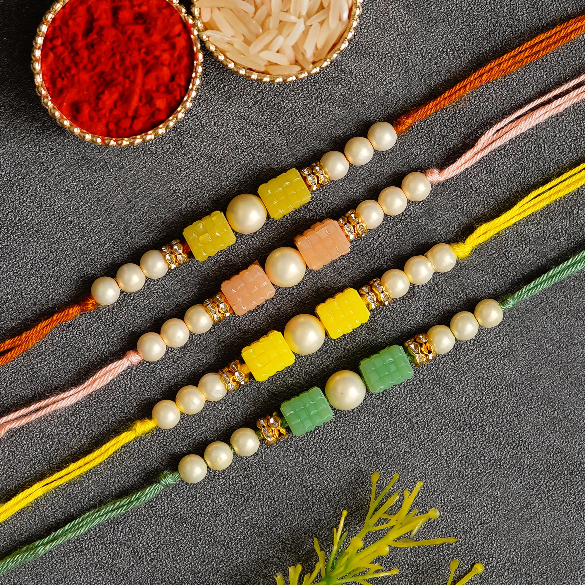 Pack of 4 Designer Rakhis and Roli Chawal Pack