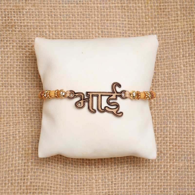 eCraftIndia Set of 2 Golden "Bhai" Word and Pearls Diamonds Designer Rakhis with Roli Chawal Pack 1