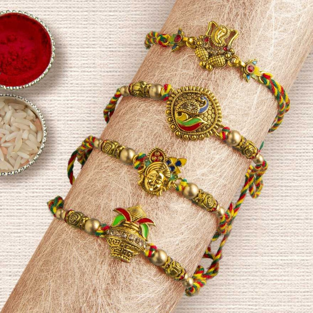 eCraftIndia Set of 4 Lord Ganesha, Peacock, Krishna & Kalash Designer Rakhis with Roli Chawal Pack