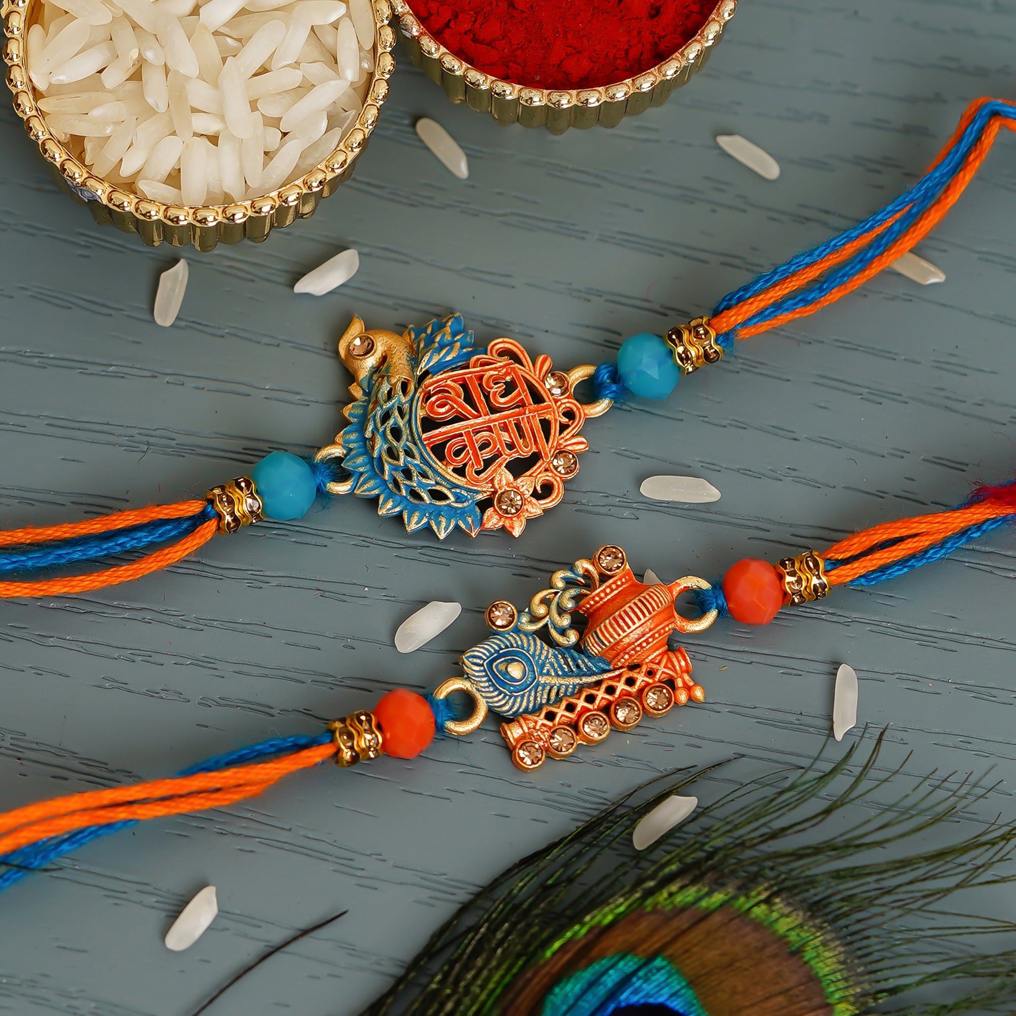 Blue & Orange Pack of 2 Religious Rakhis and Roli Chawal Pack