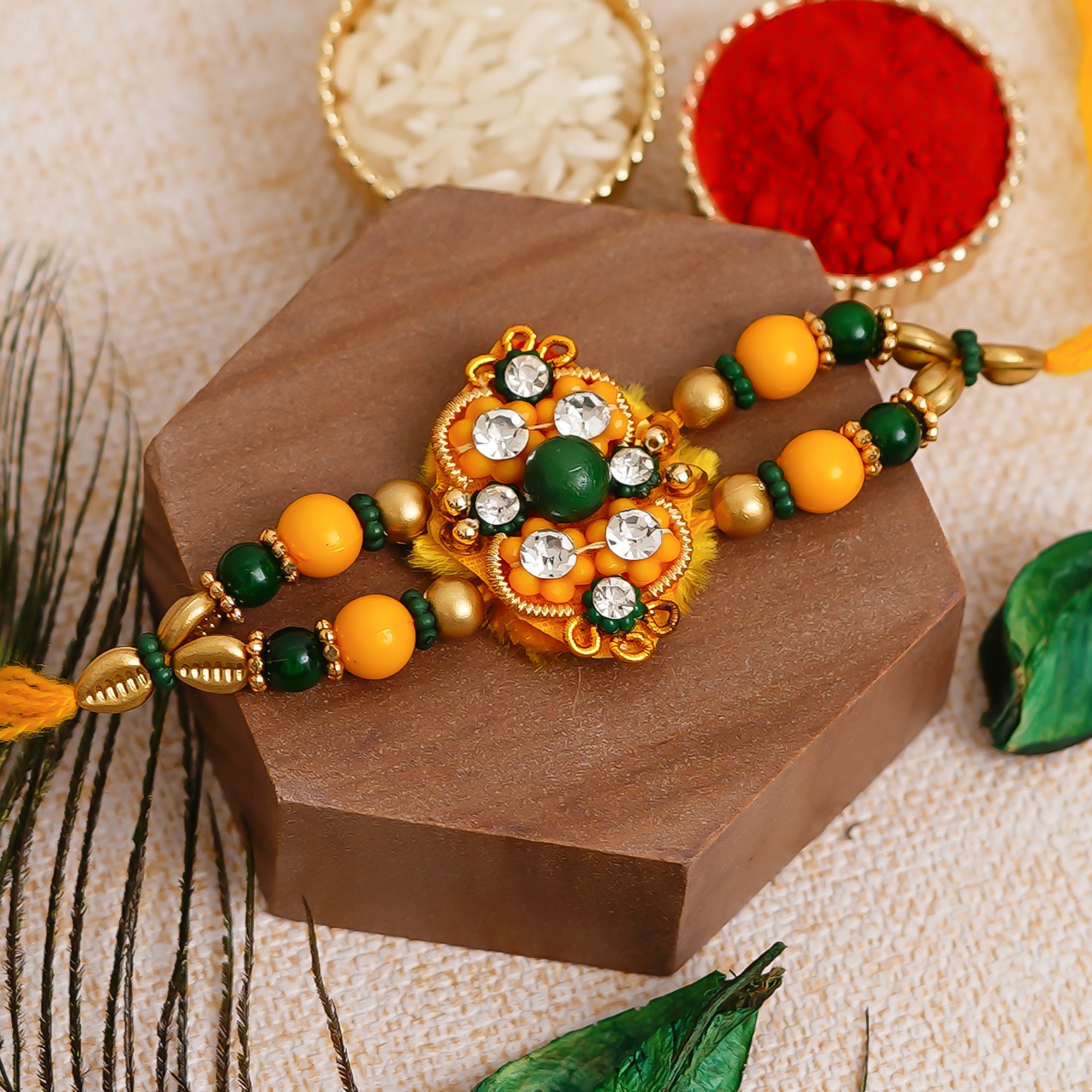 Yellow & Green Designer Rakhi and Roli Chawal Pack 1