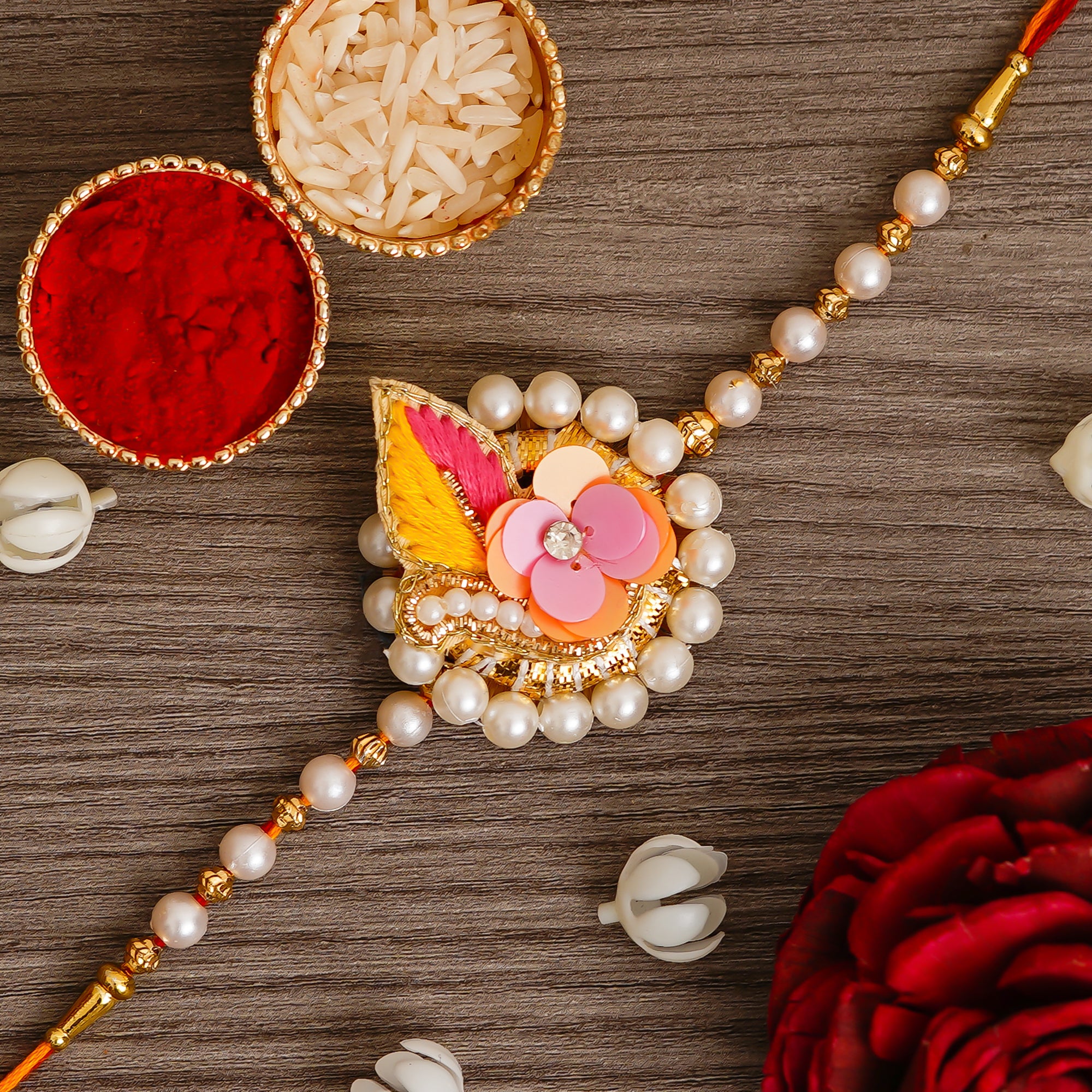 Multicolor Floral Rakhi  and Roli Chawal Pack