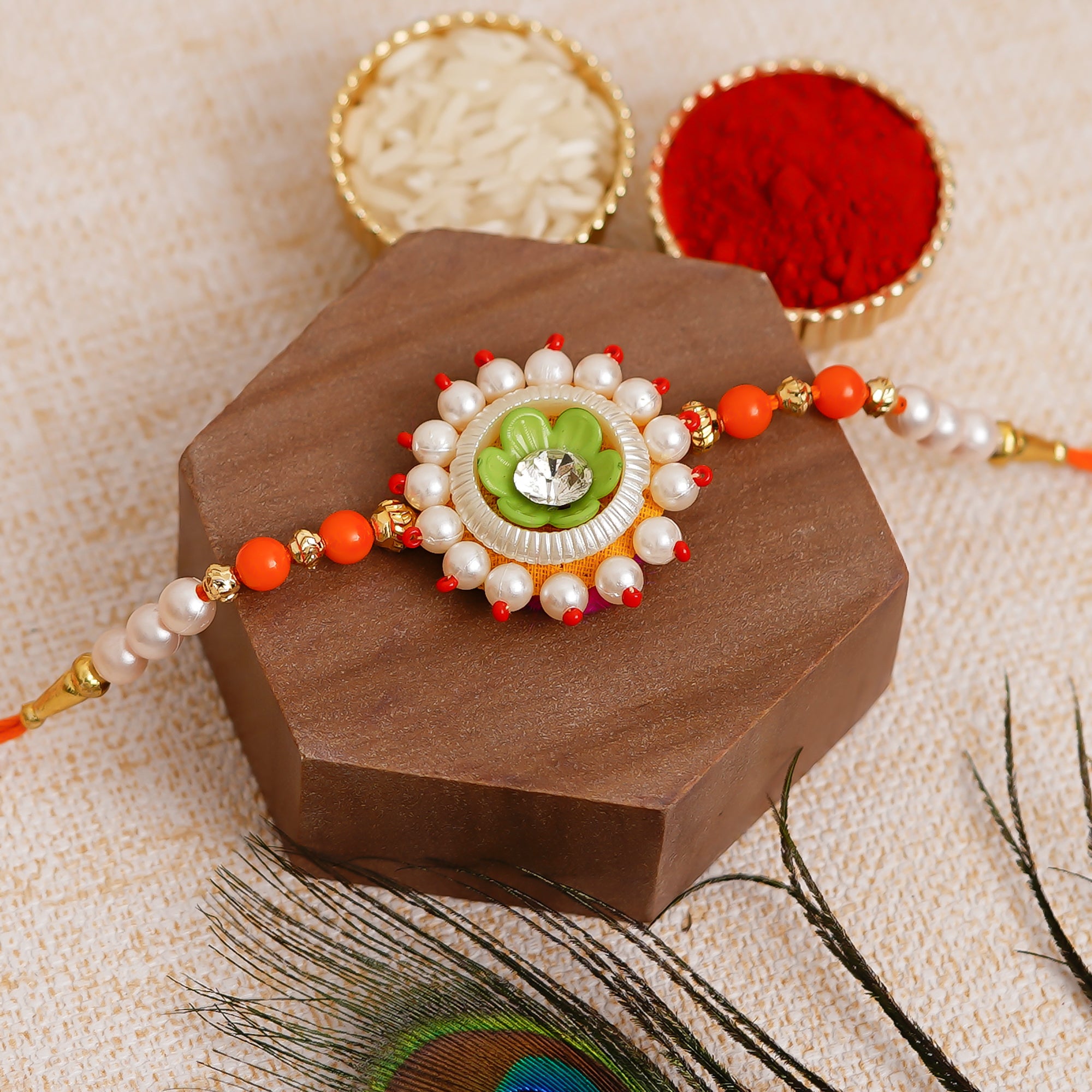 Green, Red & White Floral Rakhi  and Roli Chawal Pack