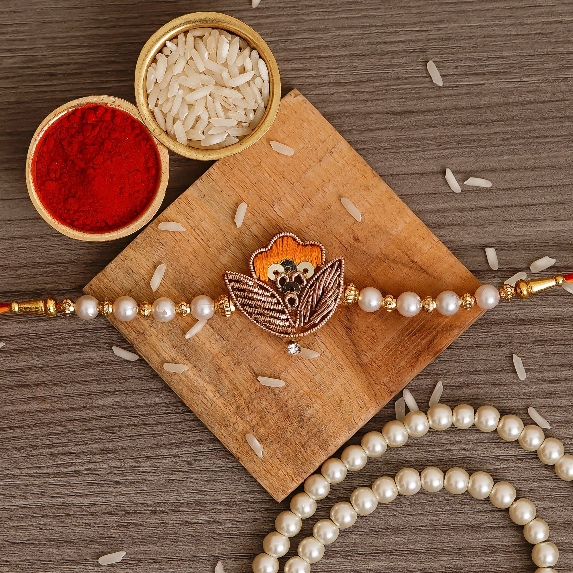 Orange Designer Pearl Leaf Rakhi  and Roli Chawal Pack 1