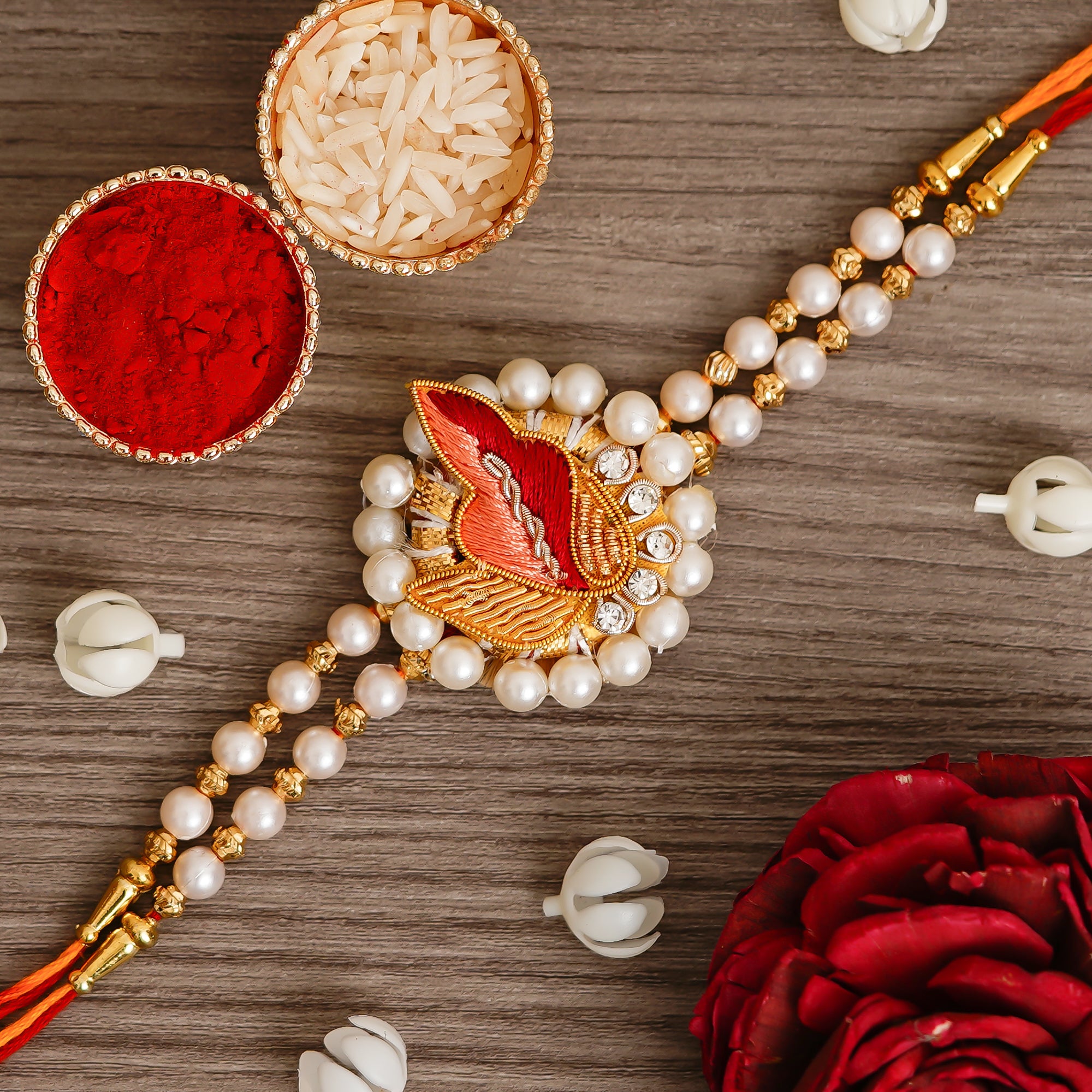 Peach & Red Designer Pearl Rakhi and Roli Chawal Pack