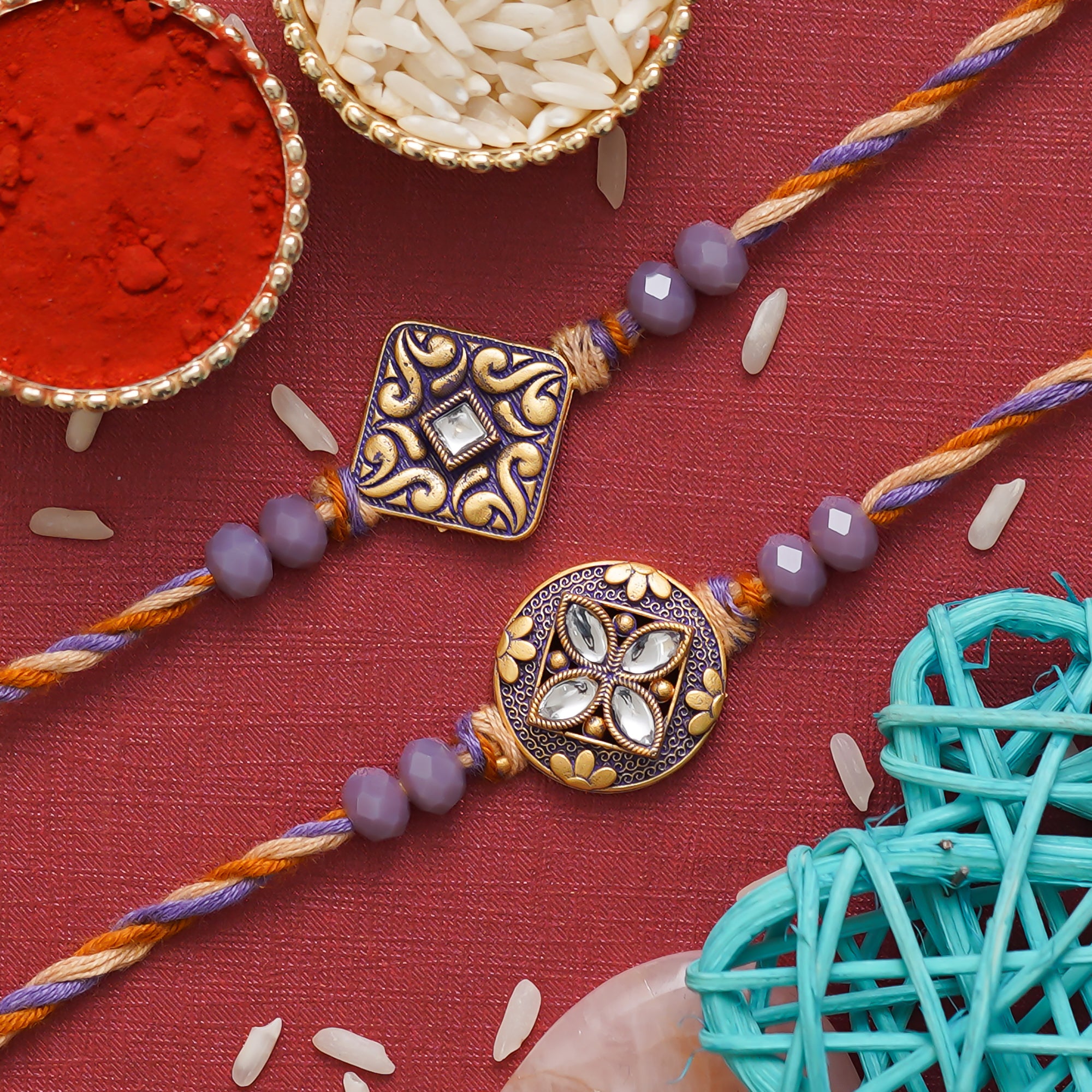 eCraftIndia Purple and Golden Set of 2 Precious Stone Designer Rakhis with Roli Chawal Pack 1