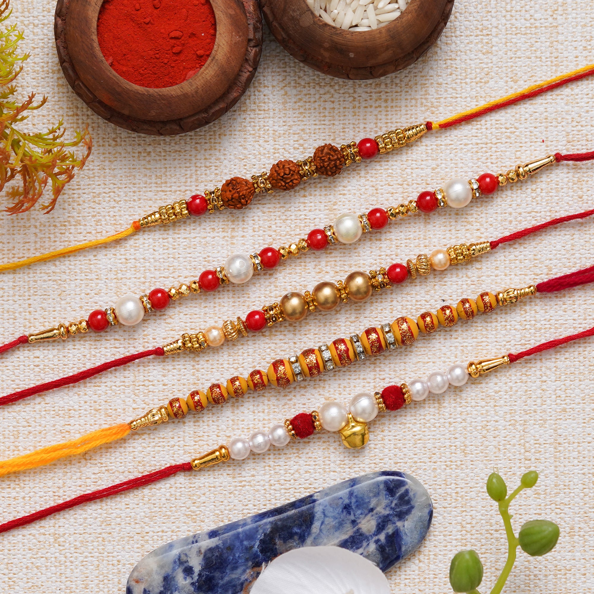 eCraftIndia Multicolor Set of 5 Rudraksha, Beads, Pearls, Diamonds Designer Rakhis with Roli Chawal Pack 1