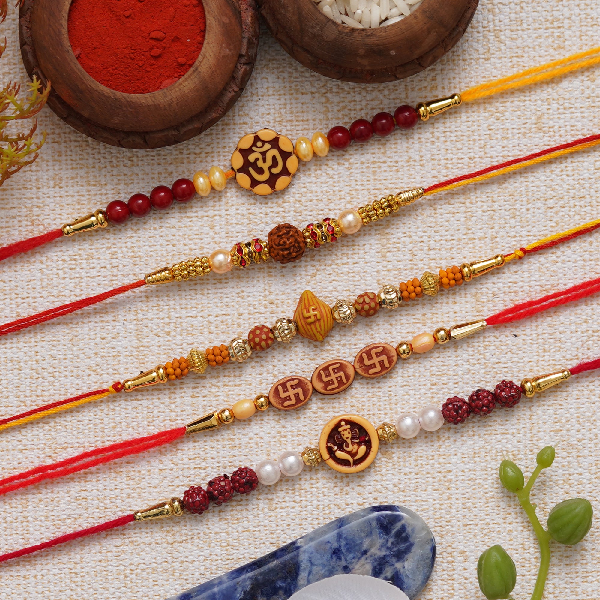 eCraftIndia Multicolor Set of 5 Om, Rudraksha, Swastik, Pearls, Ganesha Religious Designer Rakhis with Roli Chawal Pack 1