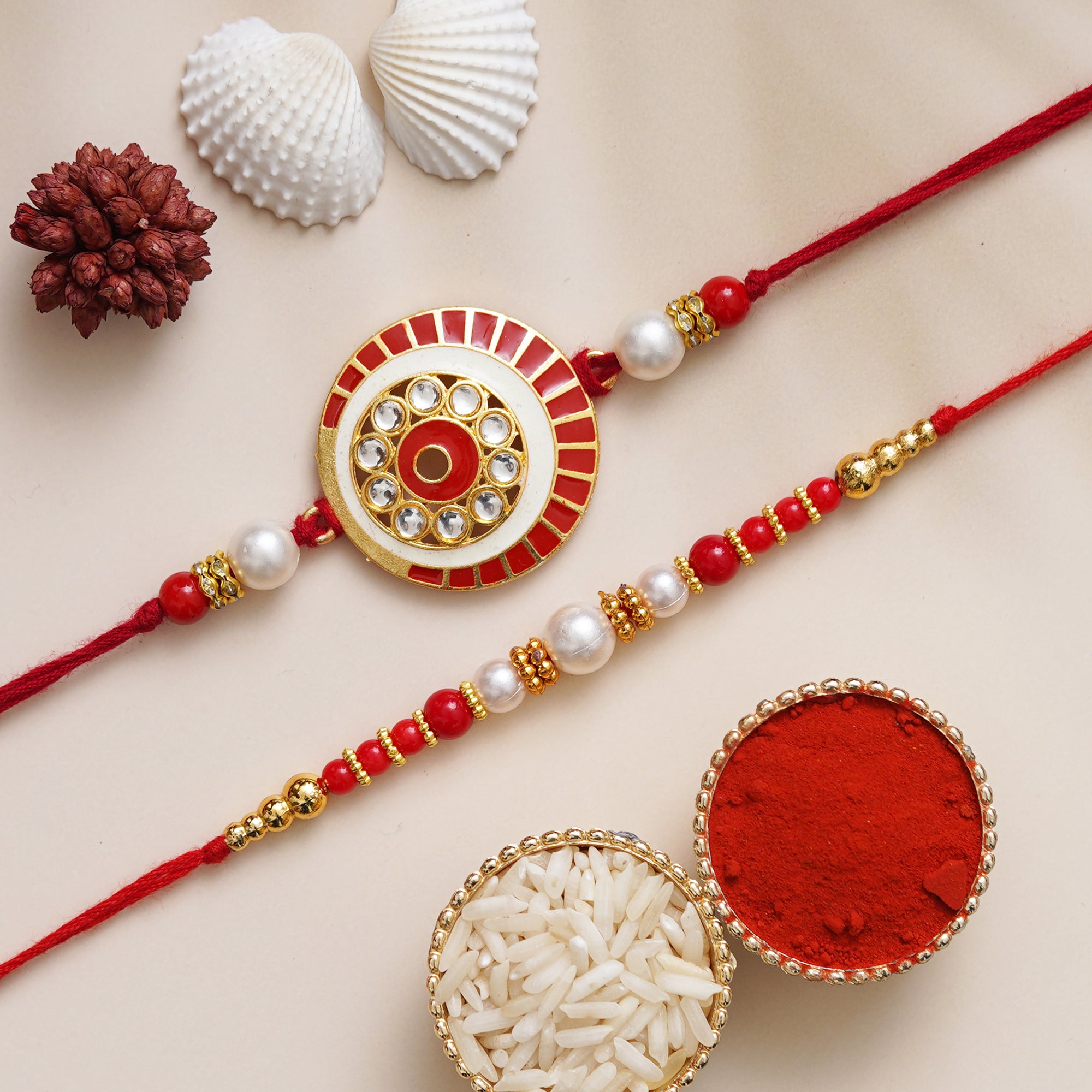 eCraftIndia Set of 2 Diamonds and Pearls Designer Rakhis with Roli Chawal Pack