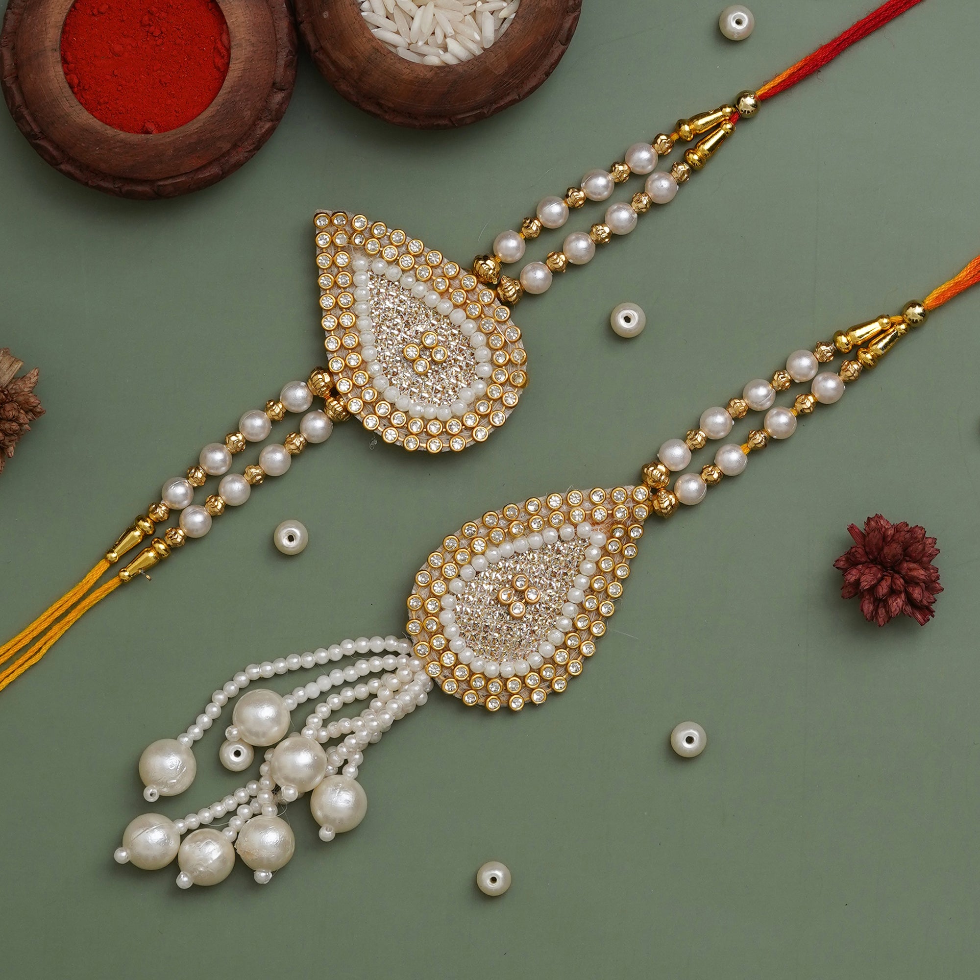 eCraftIndia Diamonds, Pearls Designer Bhaiya Bhabhi Rakhi Set with Roli Chawal Pack