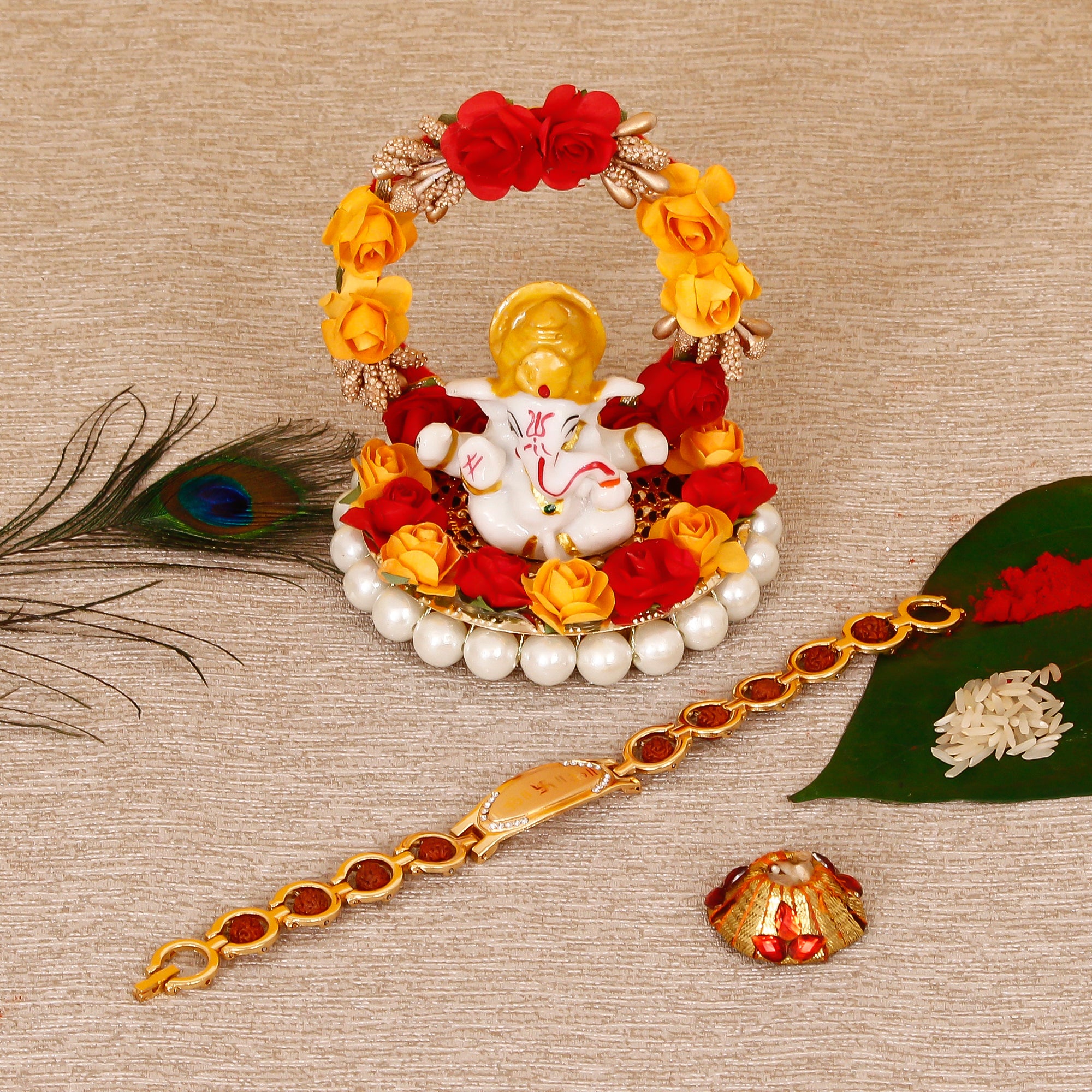 Designer Bracelet Religious Rakhi with Lord Ganesha Idol on Decorative Plate for Car & Home and Roli Tikka Matki