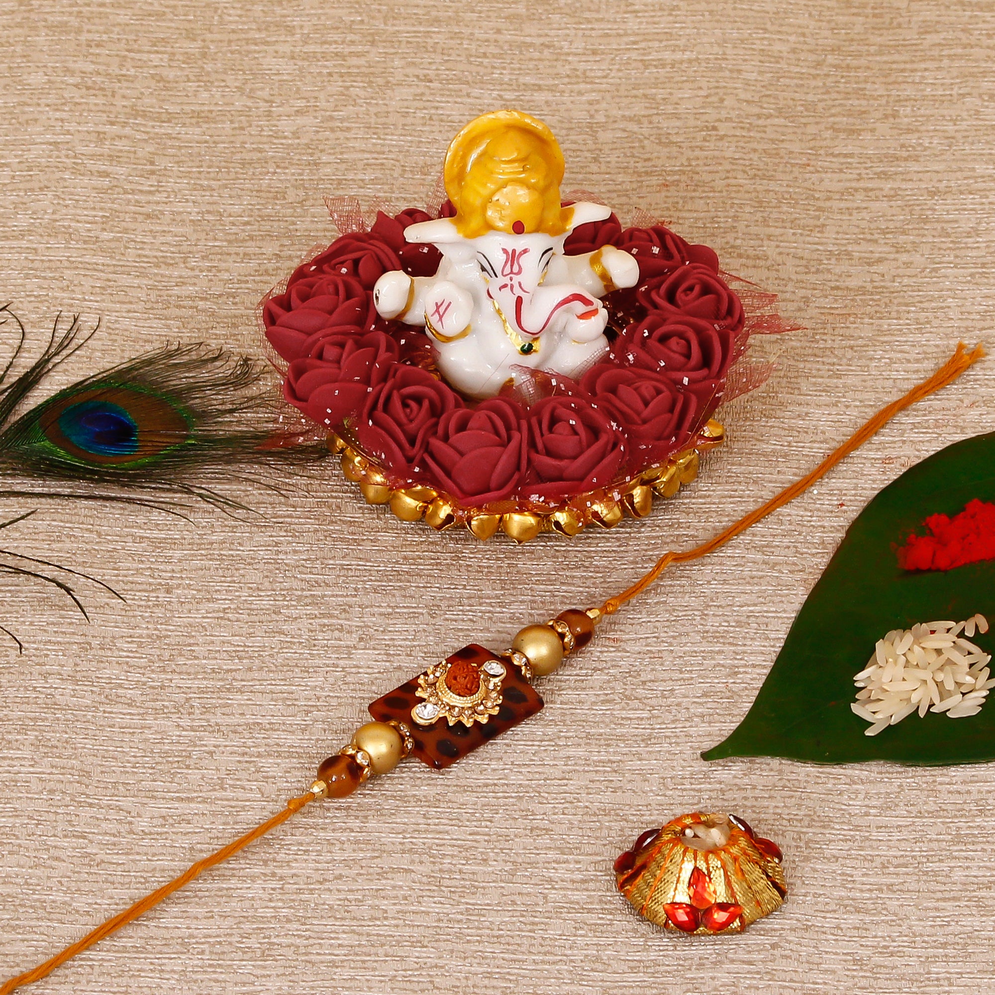 Stone Rudraksh Rakhi with Lord Ganesha Idol on Decorative Plate for Car & Home and Roli Tikka Matki