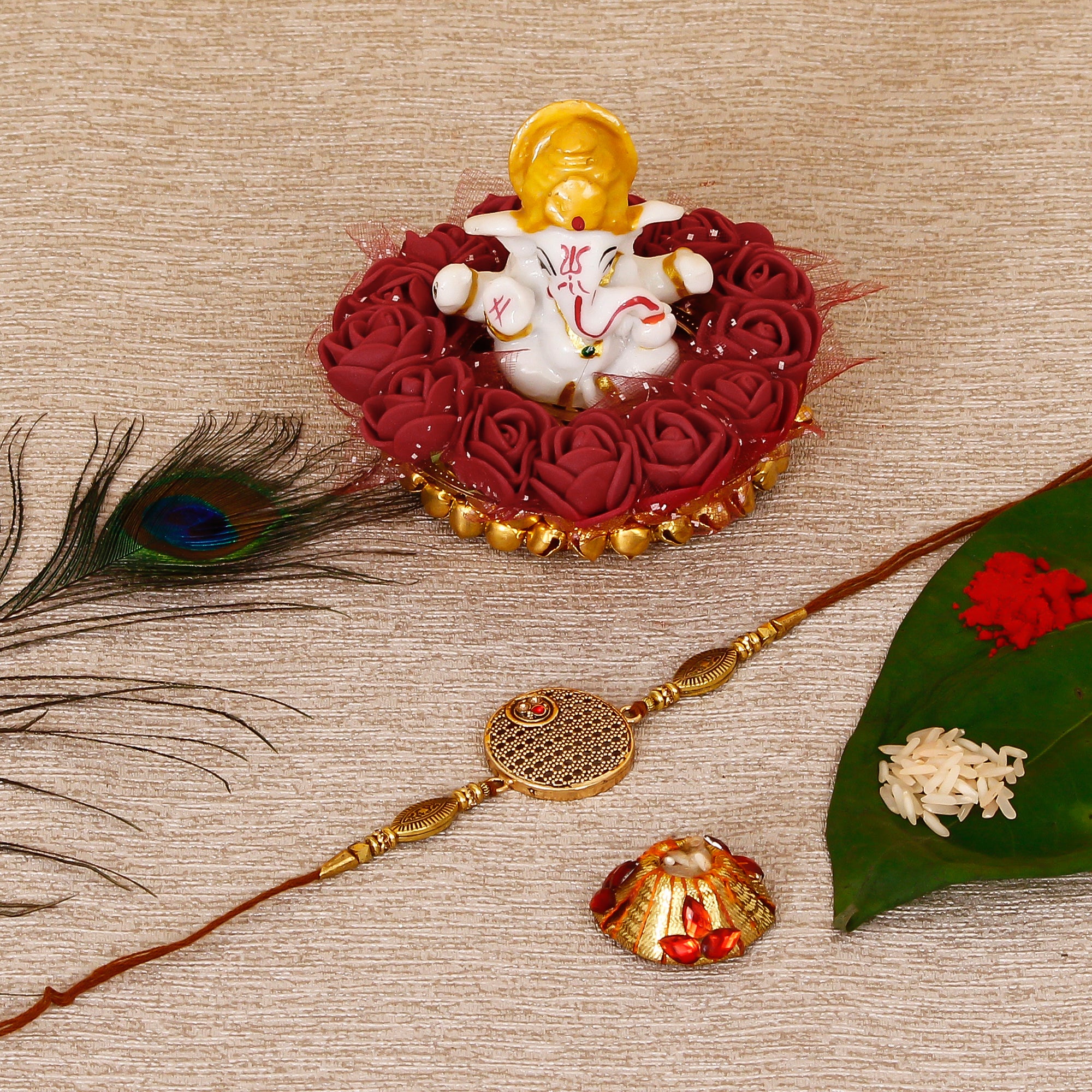 Designer Rakhi with Lord Ganesha Idol on Decorative Plate for Car & Home and Roli Tikka Matki