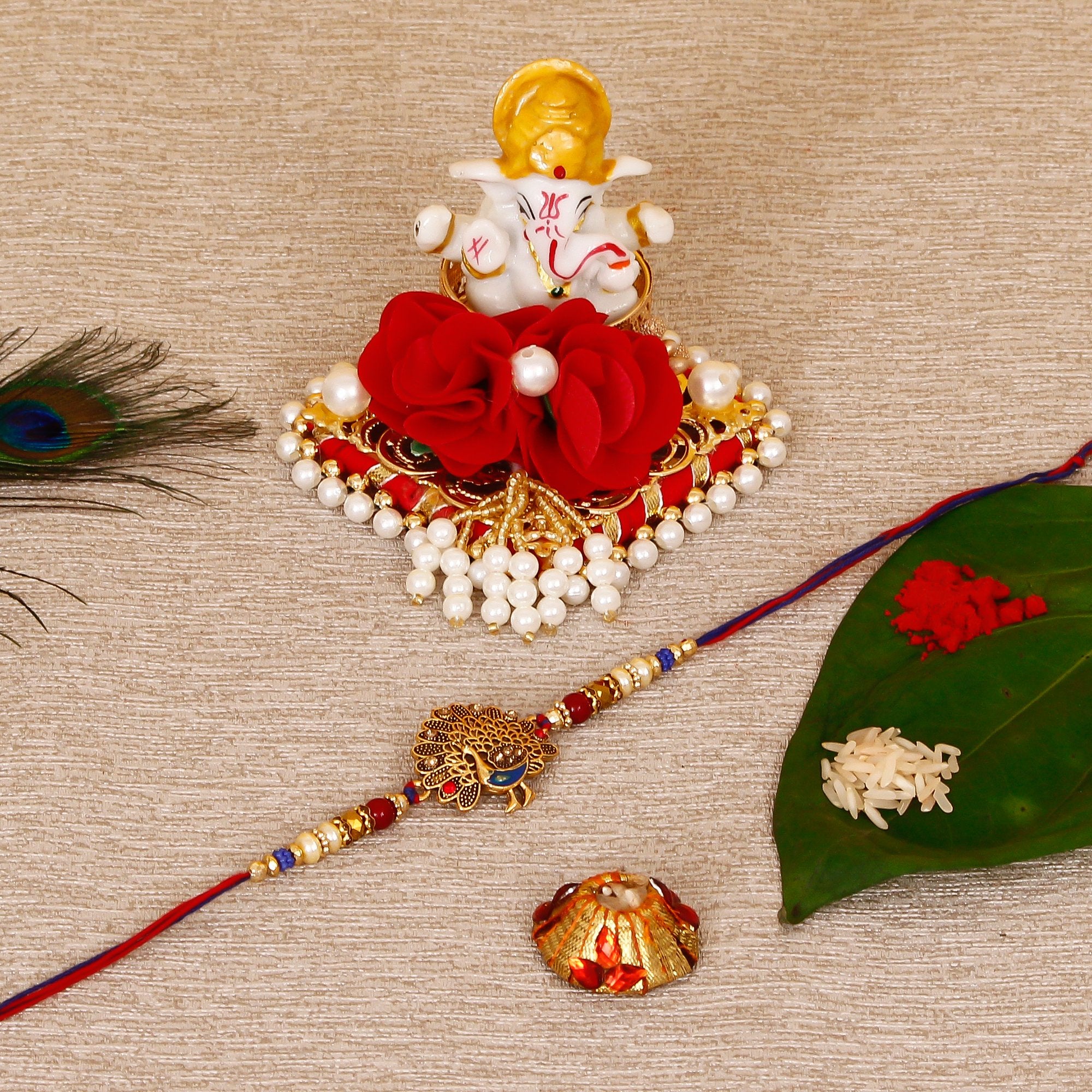 Designer Dancing Peacock Rakhi with Lord Ganesha Idol on Decorative Plate for Car & Home and Roli Tikka Matki