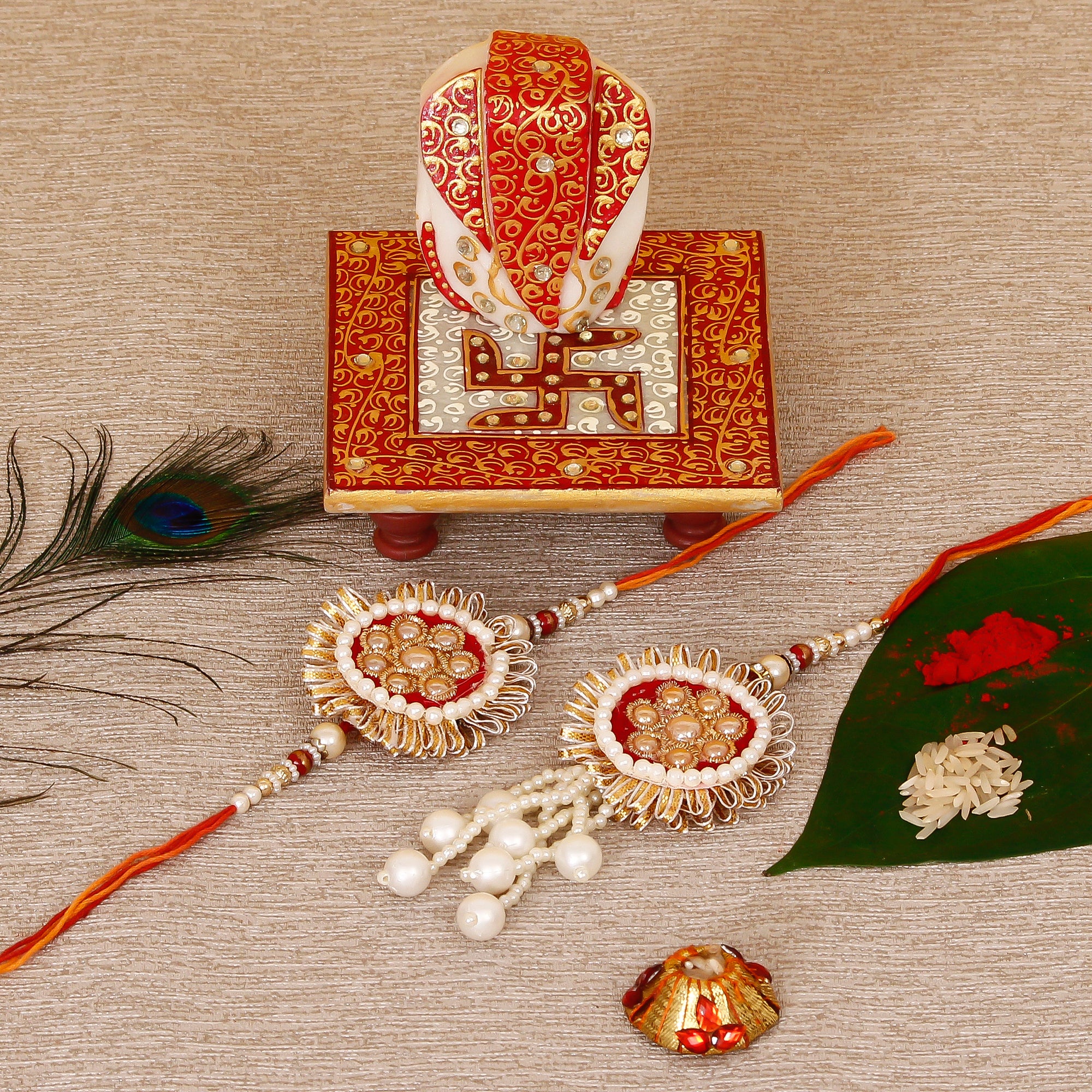 Designer Bhaiya Bhabhi Rakhi with Ridhi Sidhi Marble chowki and Roli Tikka Matki