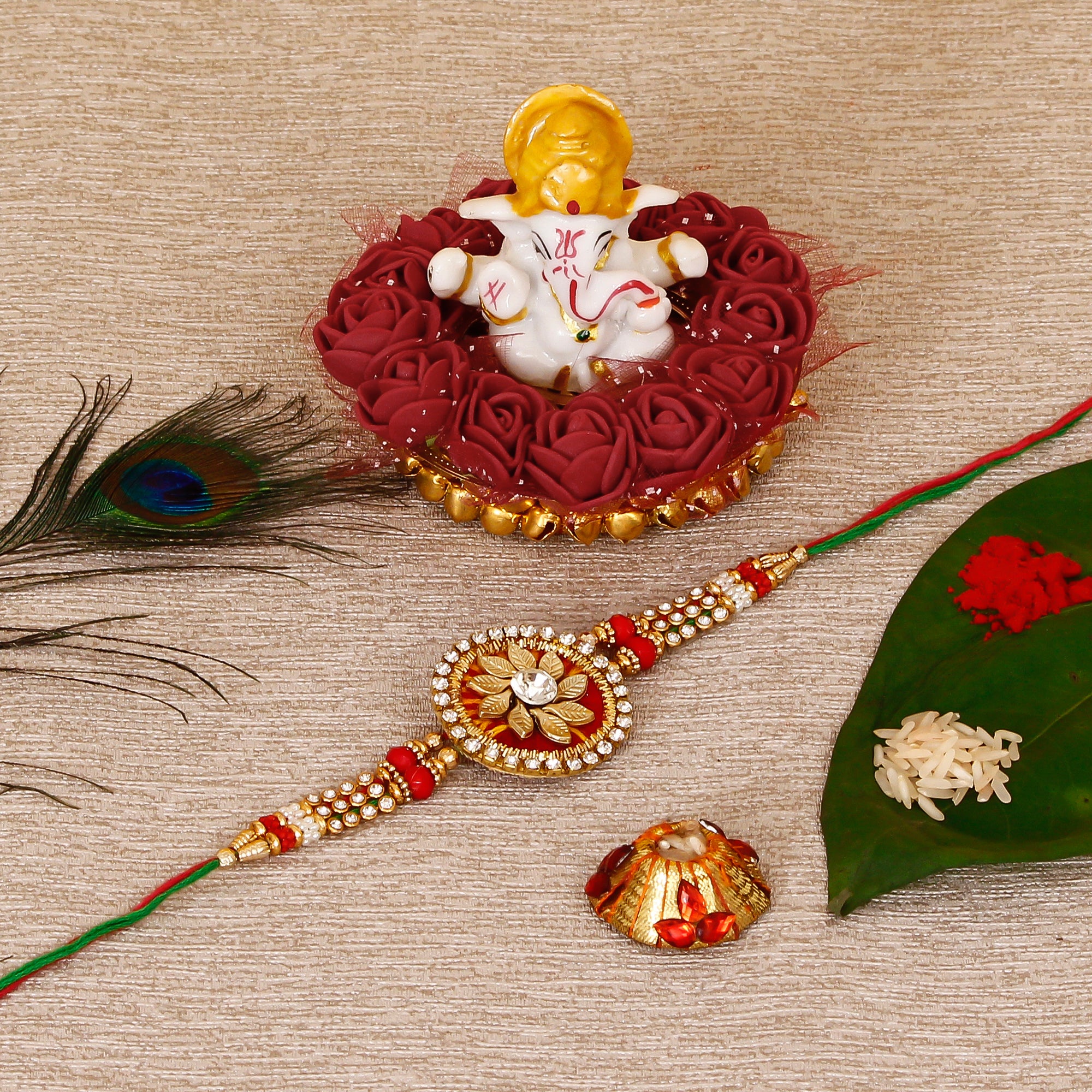 Designer Rakhi with Lord Ganesha Idol on Decorative Plate for Car & Home and Roli Tikka Matki