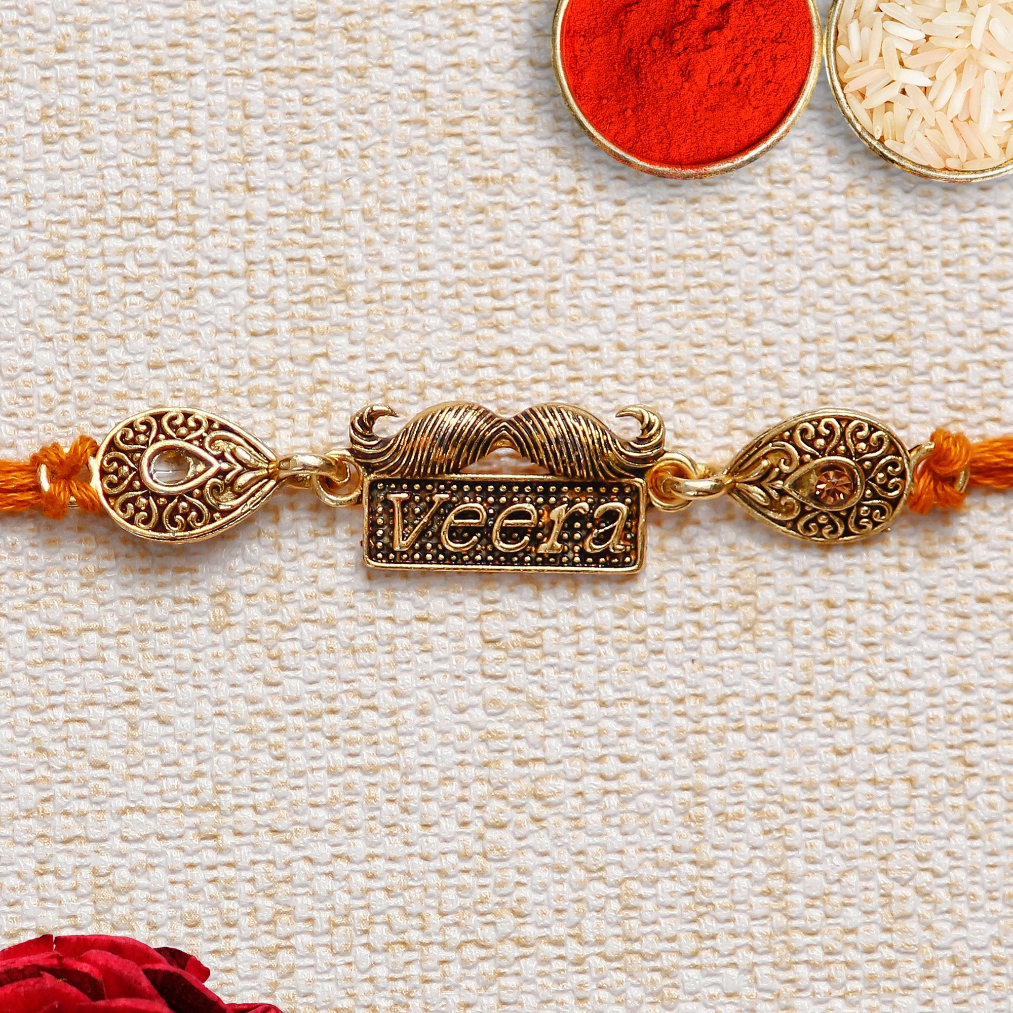 Designer Veera Rakhi with Lord Ganesha on Kundan Studded Marble Chowki and Roli Chawal Pack 1