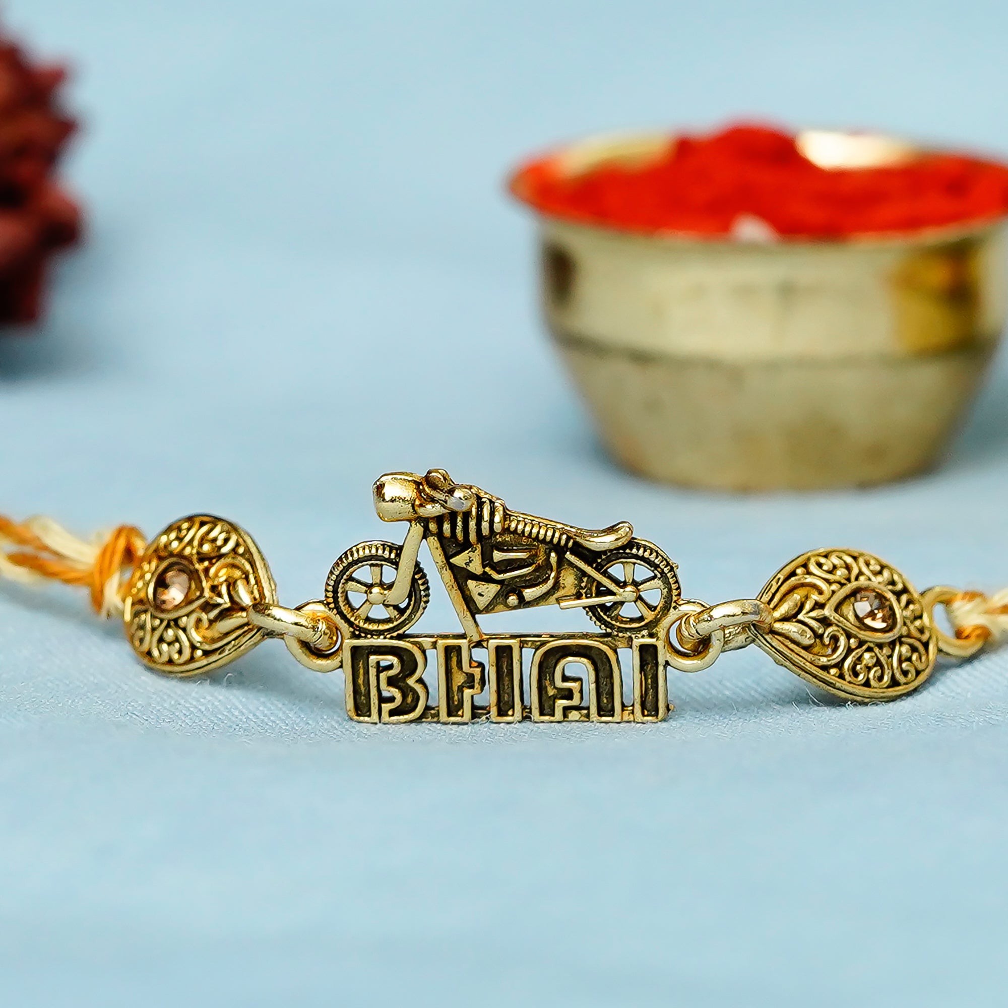 Designer Bike Bhai Rakhi with Lord Ganesha on Kundan Studded Marble Chowki and Roli Chawal Pack 1