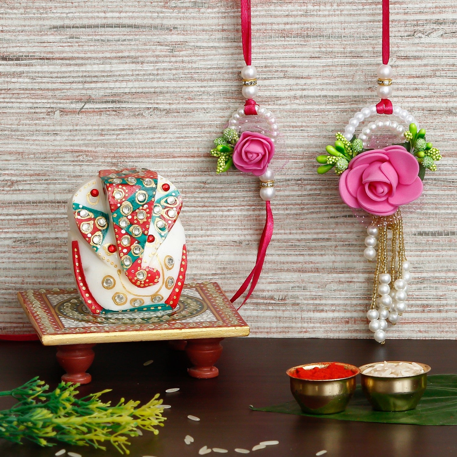 Designer Bhaiya Bhabhi Rakhi with Lord Ganesha on Kundan Studded Marble Chowki and Roli Chawal Pack