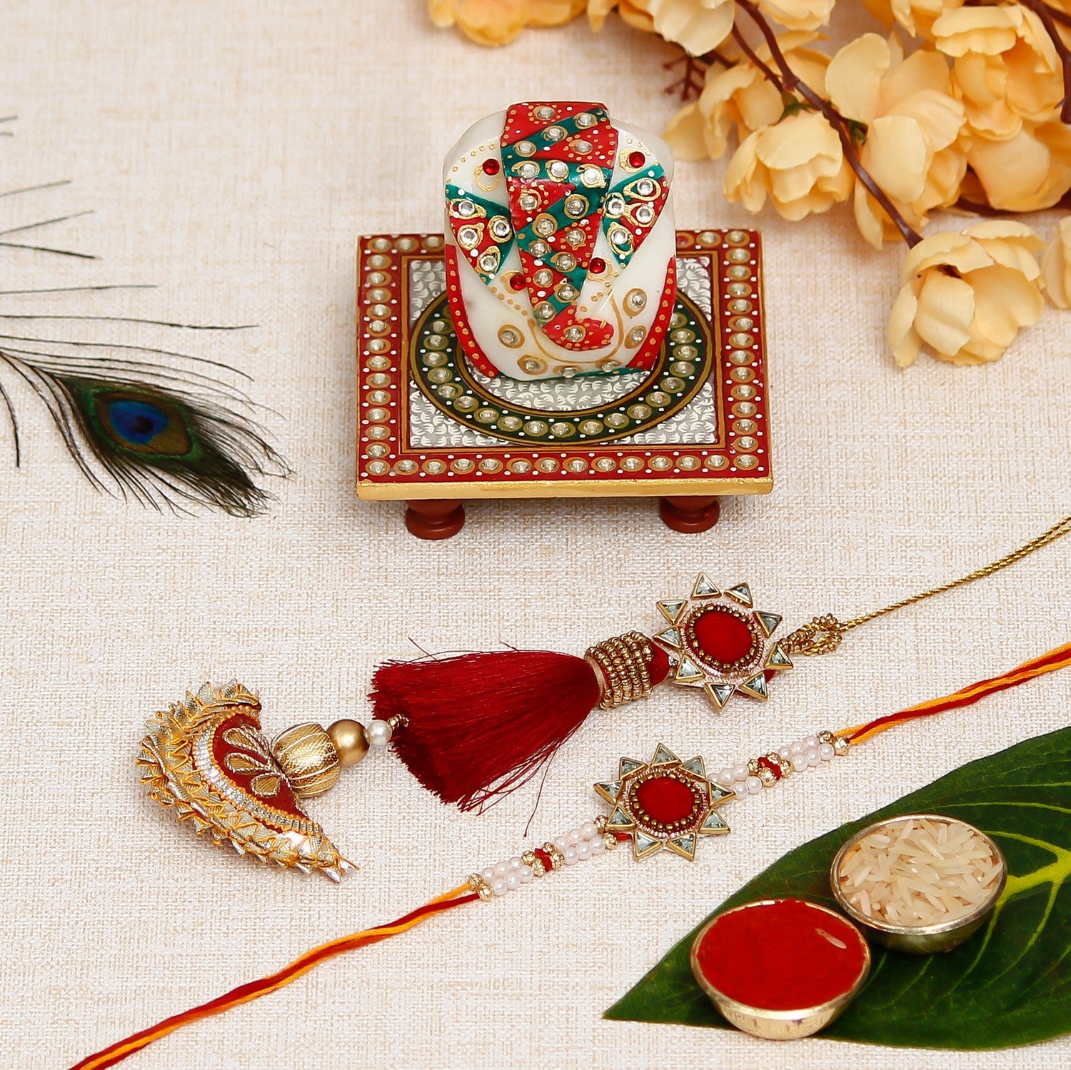 Designer Handcrafted Premium Bhaiya Bhabhi Rakhi with Lord Ganesha on Kundan Studded Marble Chowki and Roli Chawal Pack