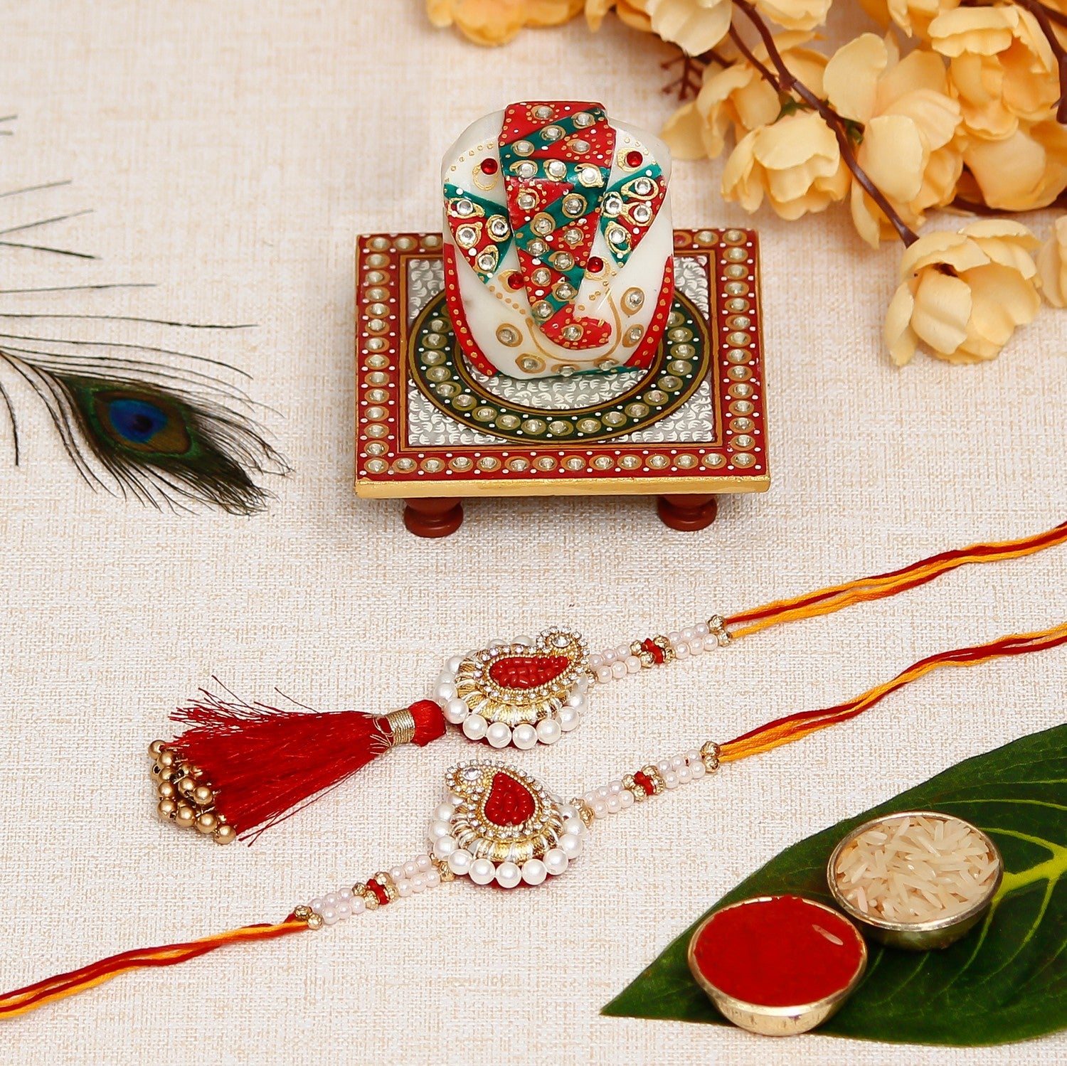 Designer Handcrafted Premium Bhaiya Bhabhi Rakhi with Lord Ganesha on Kundan Studded Marble Chowki and Roli Chawal Pack