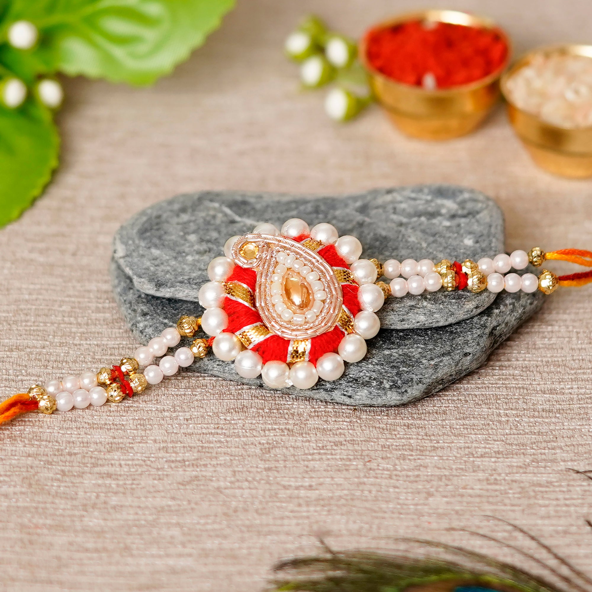 Designer Handcrafted Rakhi with Lord Ganesha on Kundan Studded Marble Chowki and Roli Chawal Pack 1