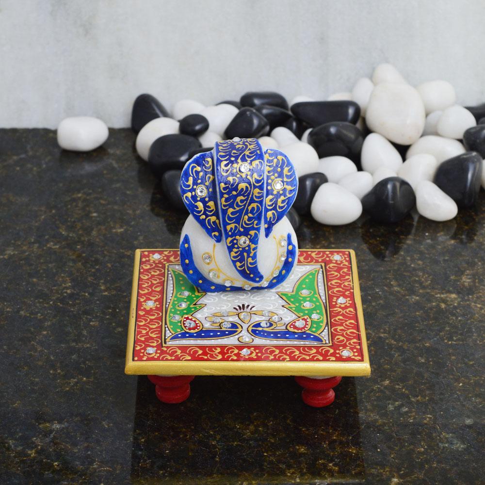 Glorious Lord Ganesha with Peacock on Marble Chowki 1