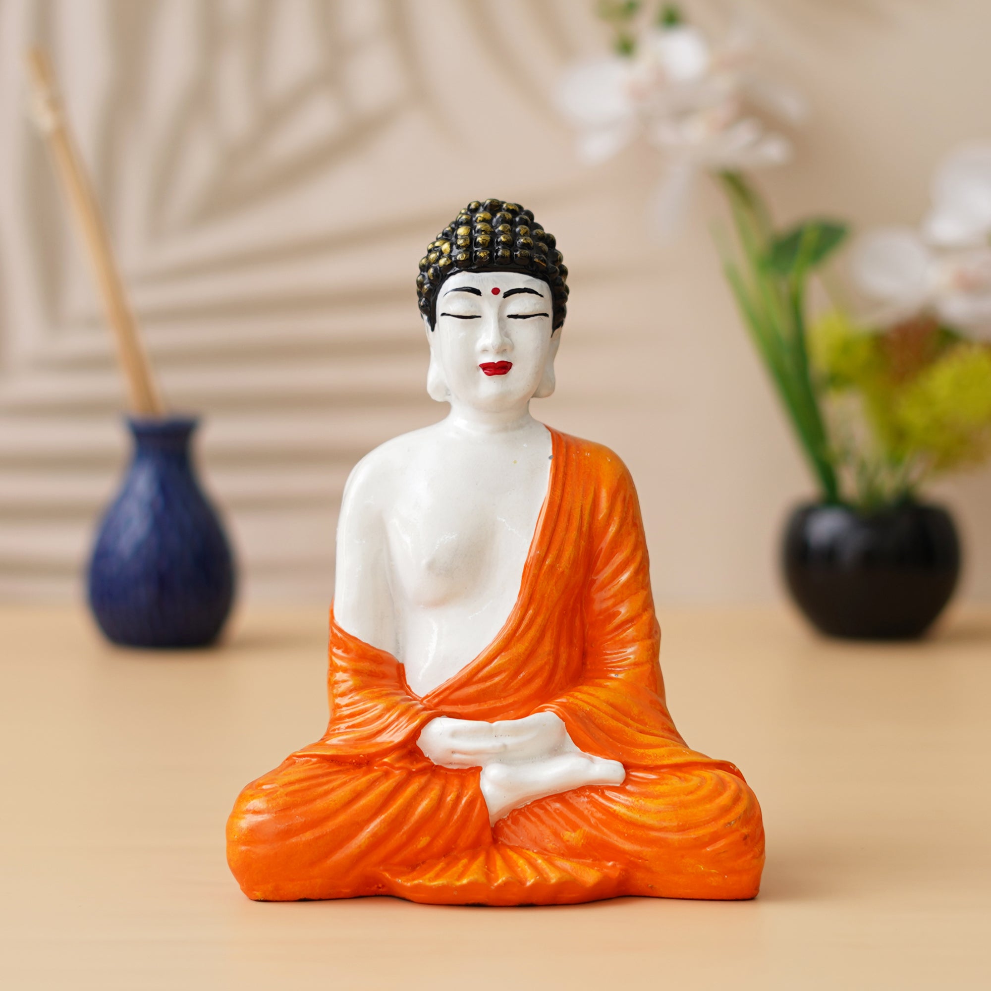 eCraftIndia Orange, & White Polyresin Handcrafted Meditating Buddha Statue 1