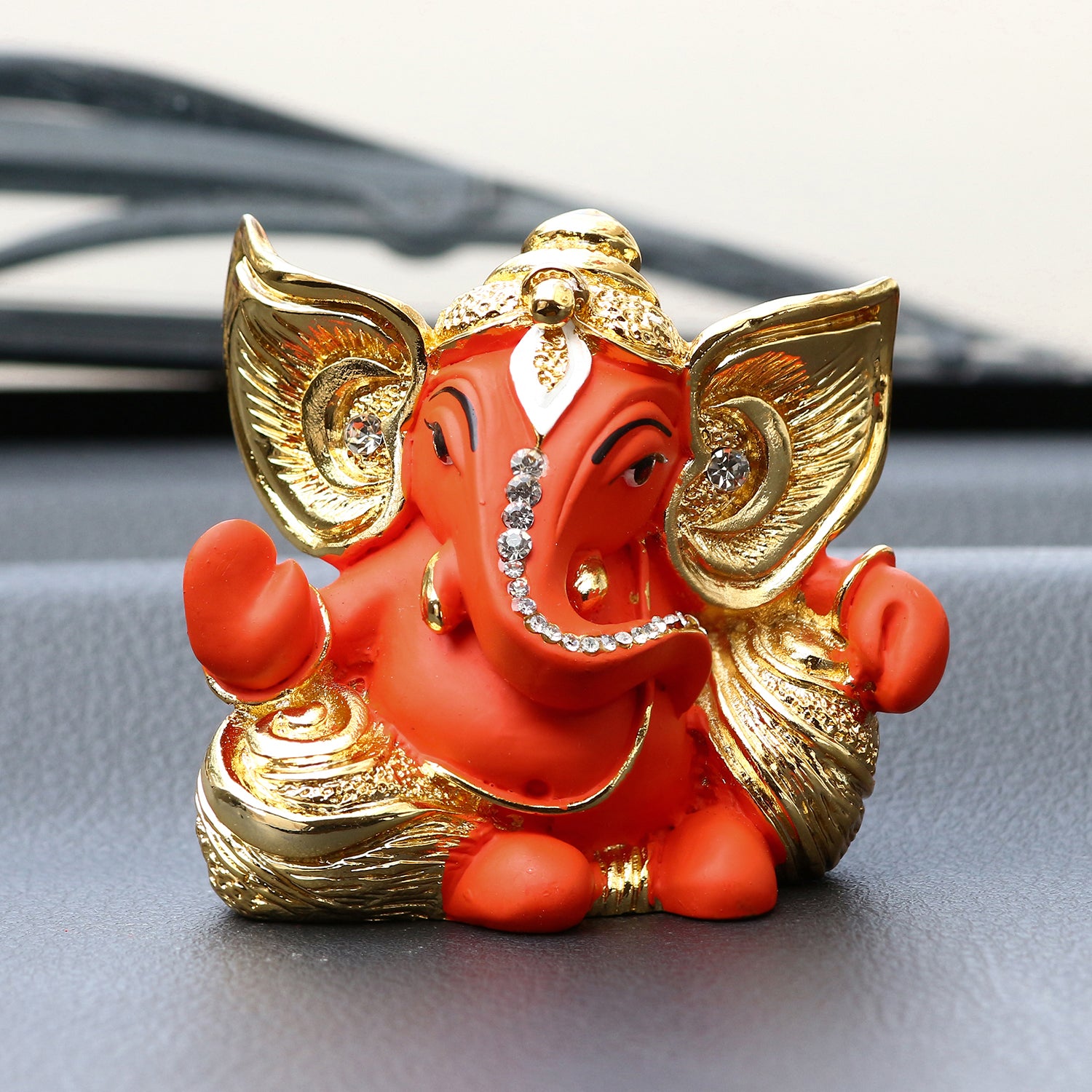 Gold Plated and Orange Polyresin Lord Ganesha Idol for Home, Temple, Office and Car Dashboard 1