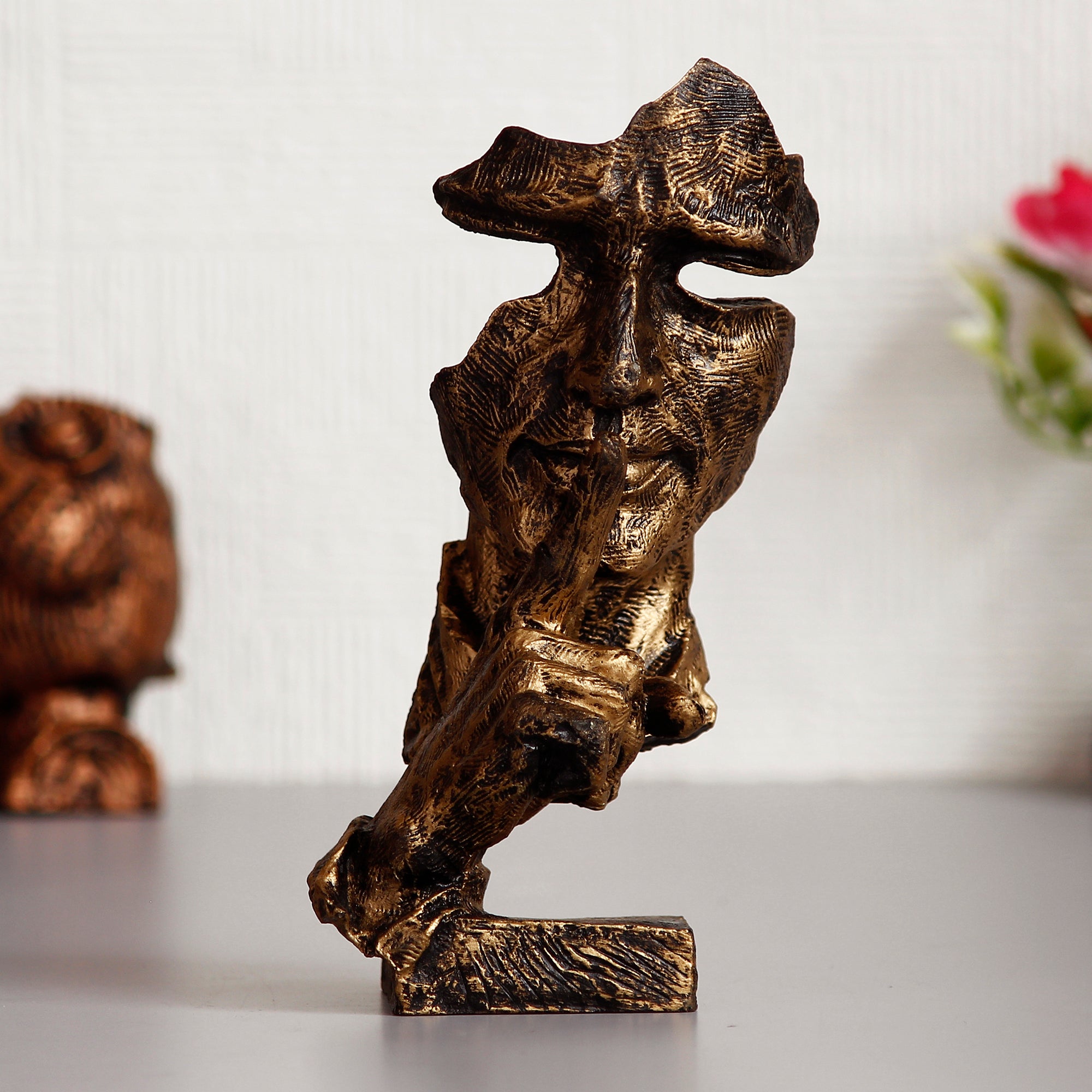 Brown Polyresin Antique Finish man with finger on lips Handcrafted Decorative Showpiece