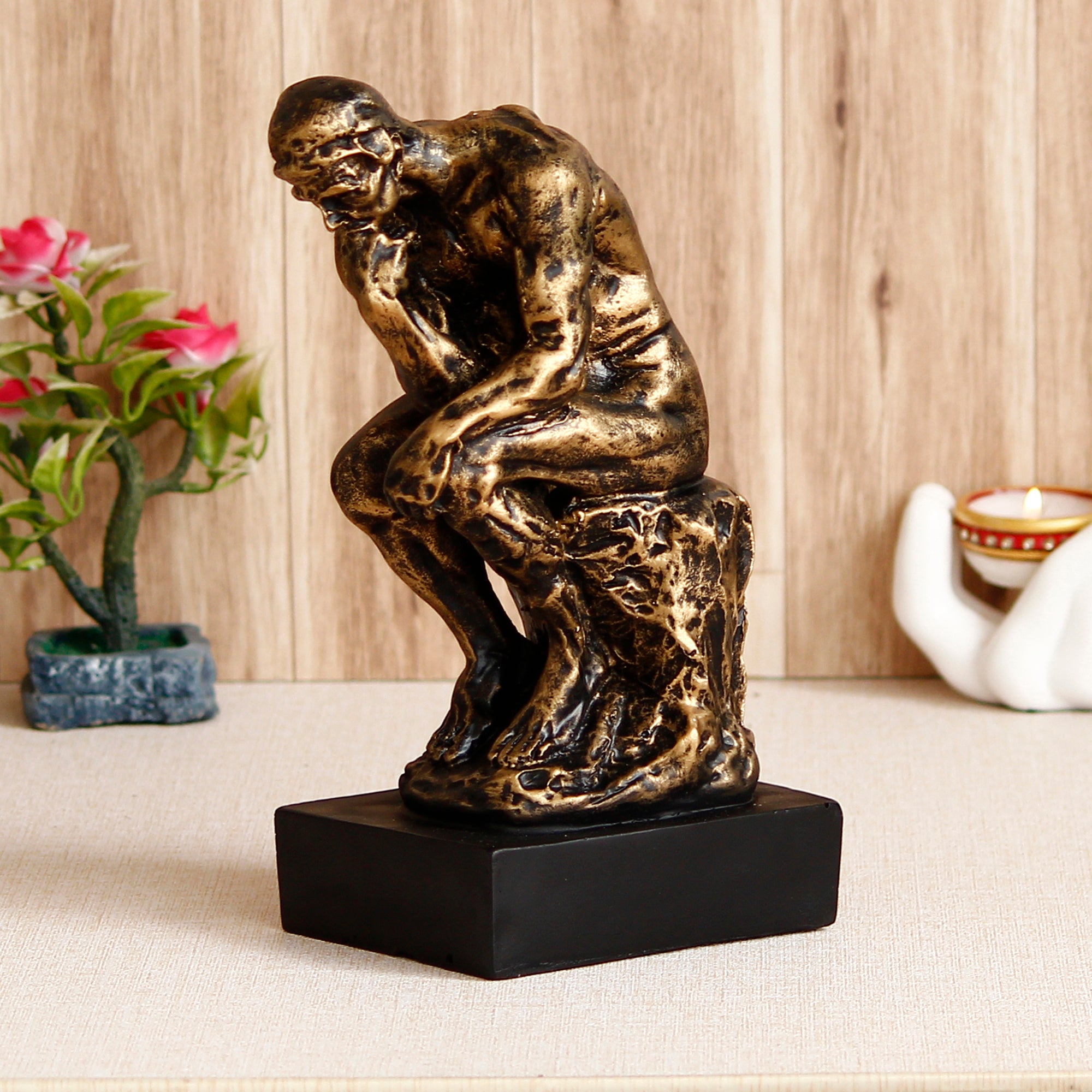 Golden Polyresin Antique Finish Thinking Man Figurine Sitting on Rock Handcrafted Decorative Showpiece