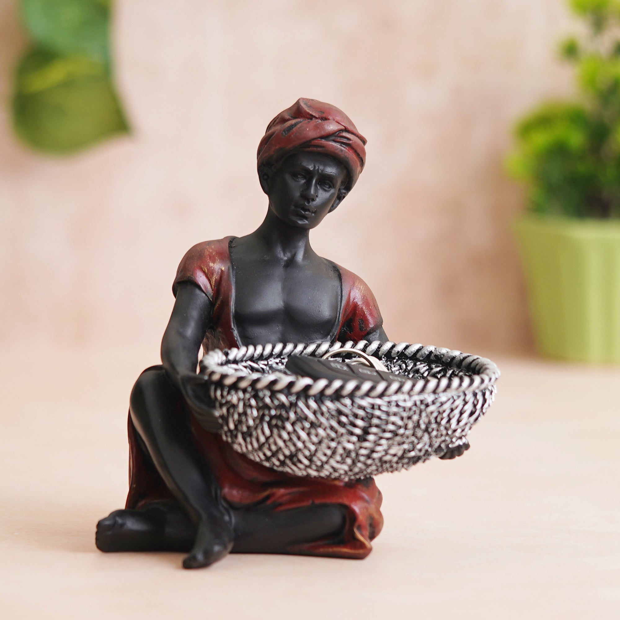 eCraftIndia Red Black Polyresin Sitting Man Statue Carrying Basket in Hands Human Figurine Decorative Showpiece