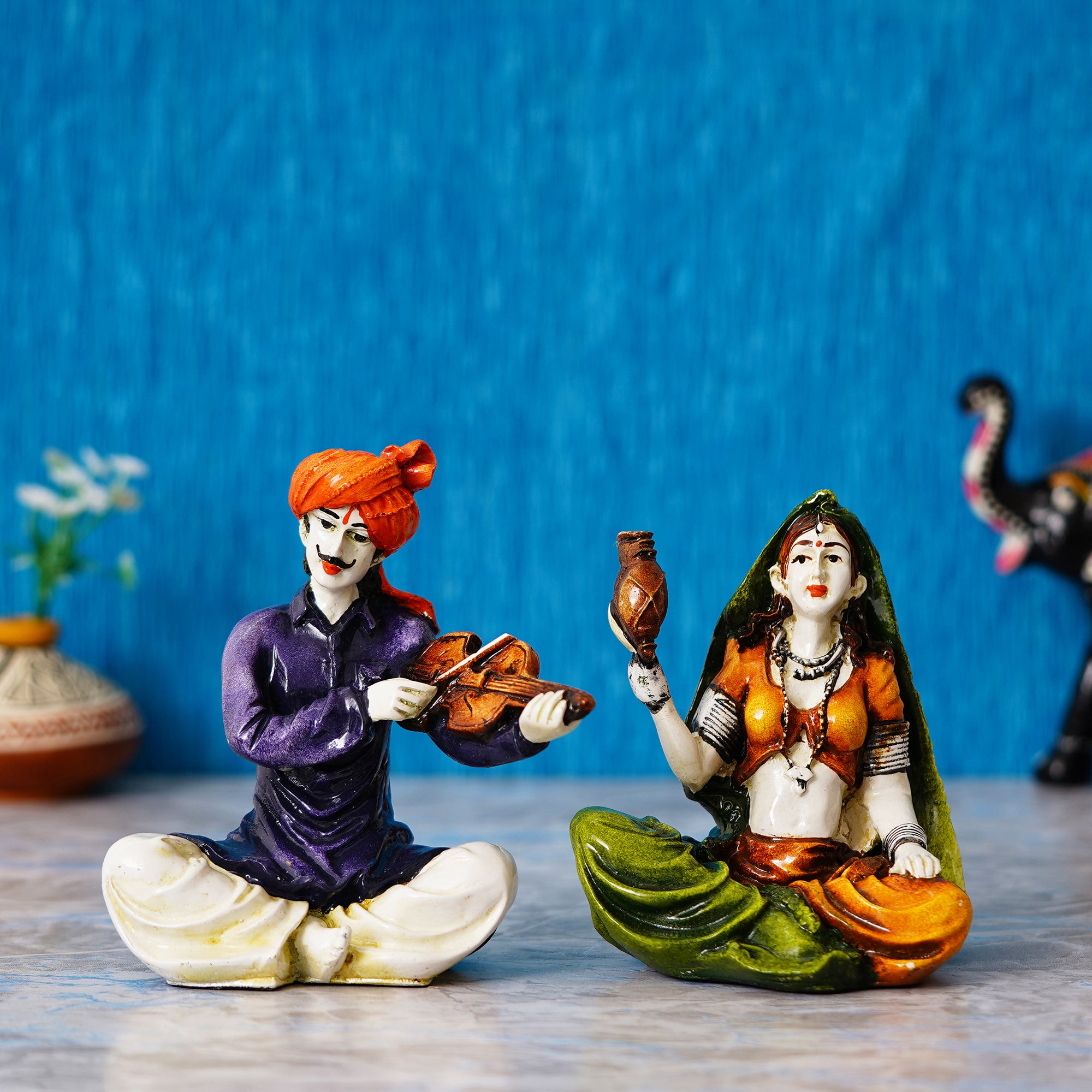 Colorful Combo of Rajasthani Craftsmen and Lady Playing a Musical Instrument Statue 1