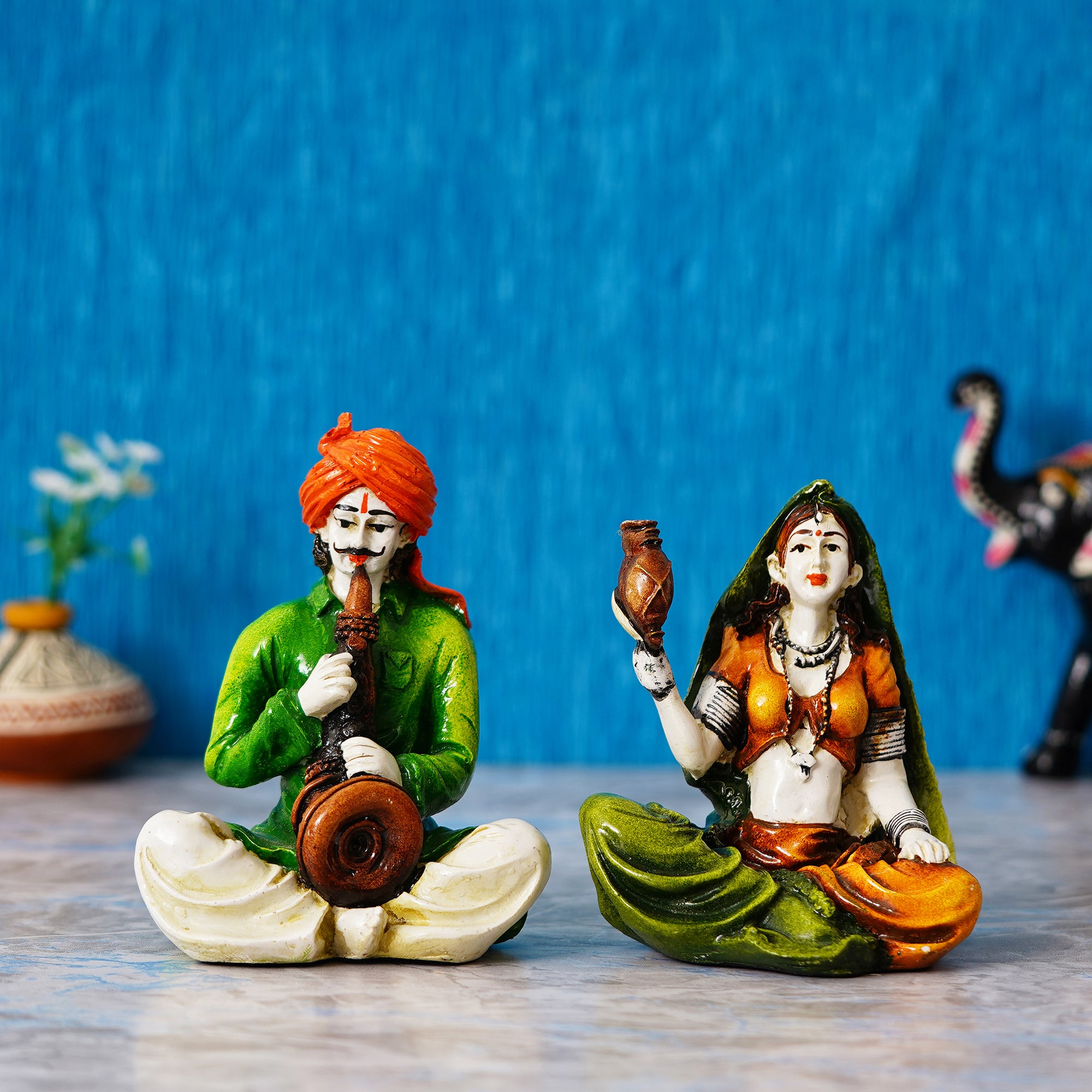 Colorful Combo of Rajasthani Craftsmen and Lady Playing a Musical Instrument Statue 1