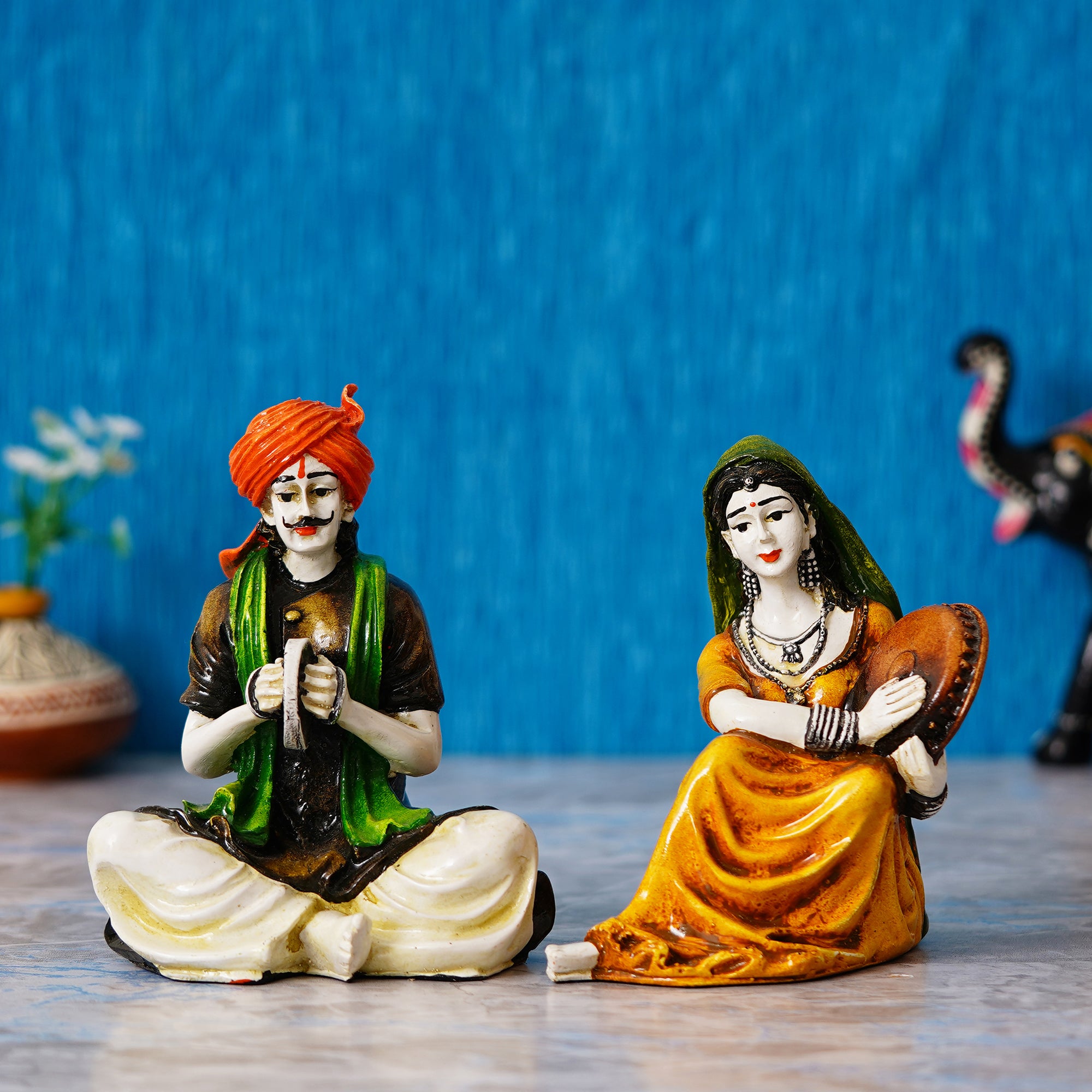 Colorful Combo of Rajasthani Craftsmen and Lady Playing a Musical Instrument Statue 1