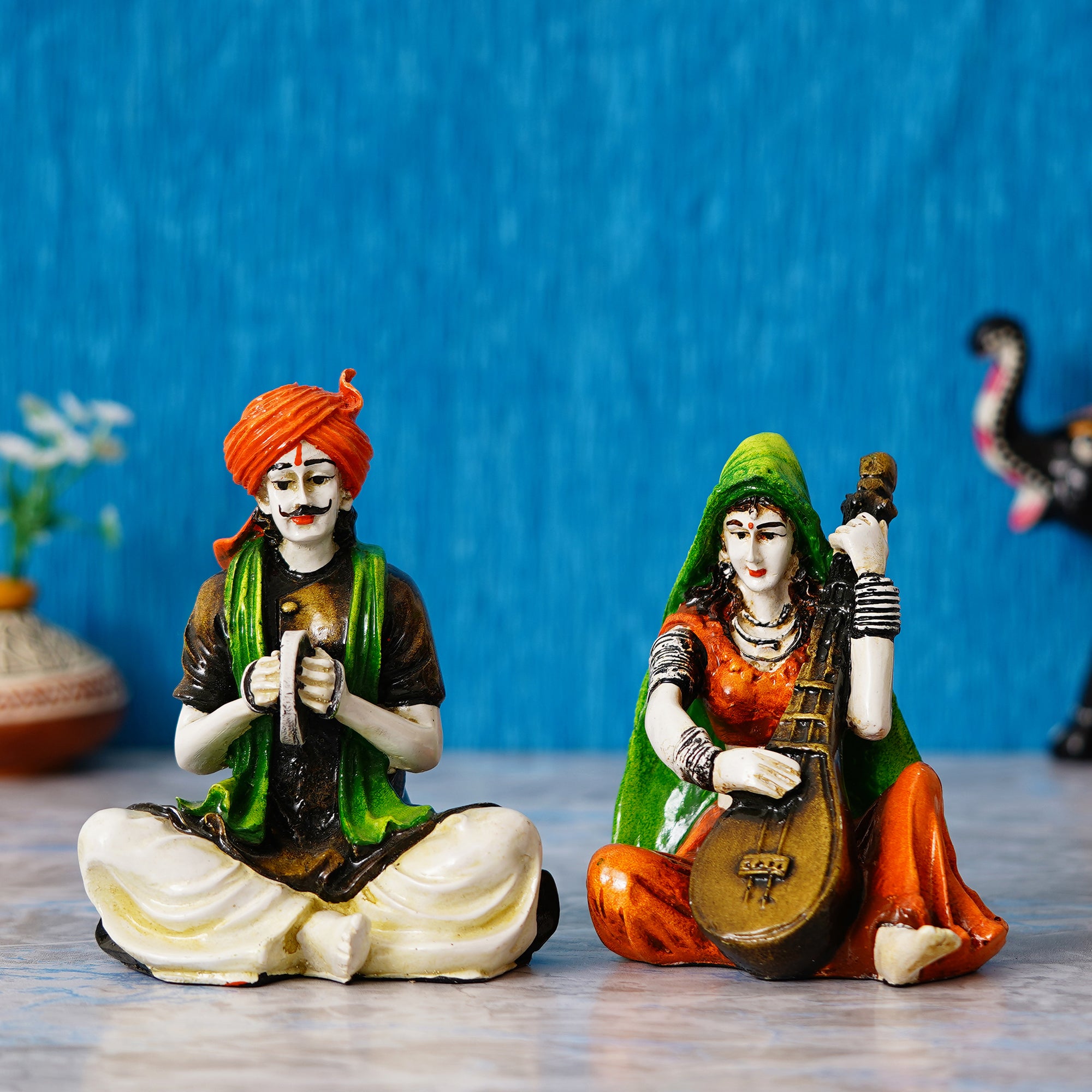 Colorful Combo of Rajasthani Craftsmen and Lady Playing a Musical Instrument Statue 1