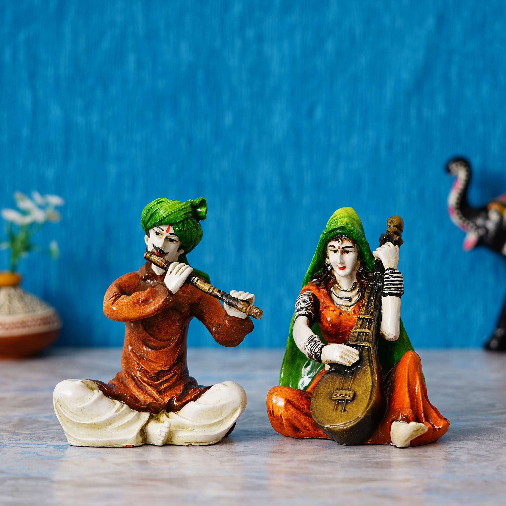 Colorful Combo of Rajasthani Craftsmen and Lady Playing a Musical Instrument Statue 1